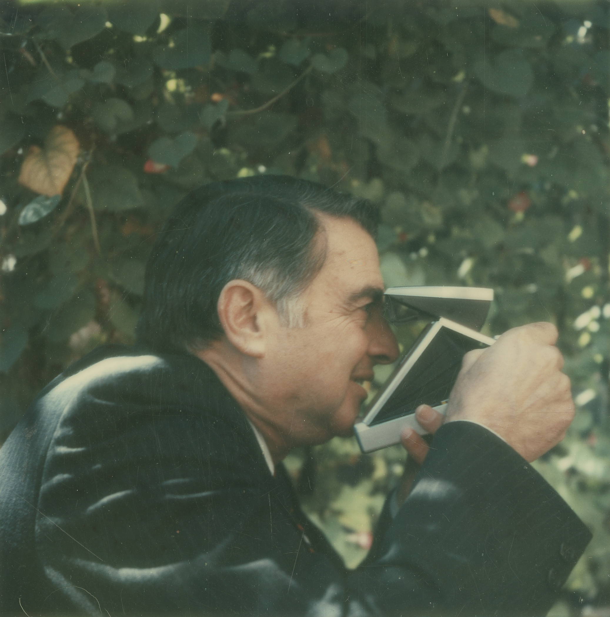 Edwin H. Land using one of his own creations, a Polaroid Land Camera, in 1972.