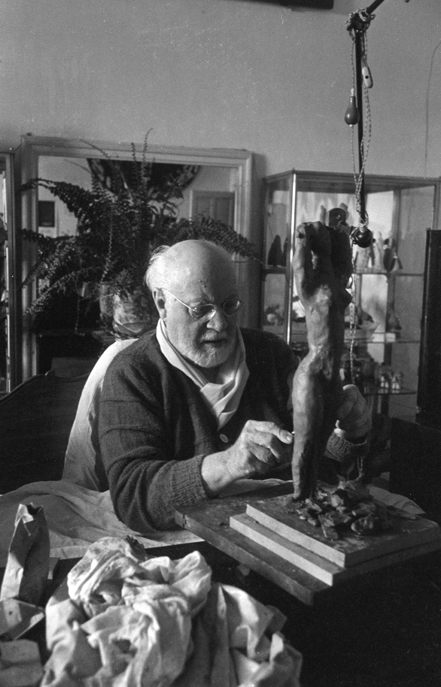 Henri Matisse sculpts a nude at home in Nice, France, 1951.
