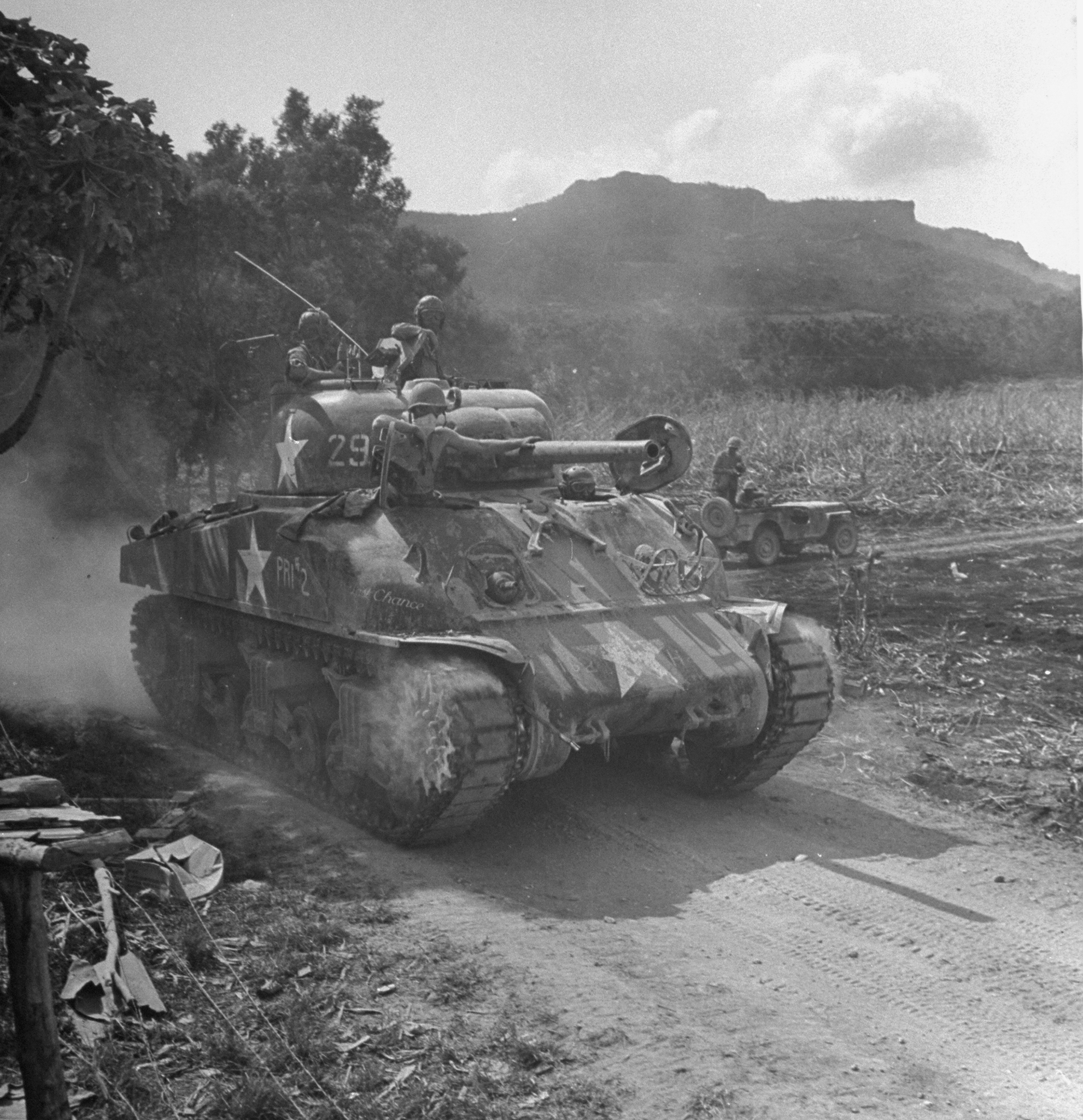 American M4 Sherman tank in action during the invasion of Saipan, 1944.