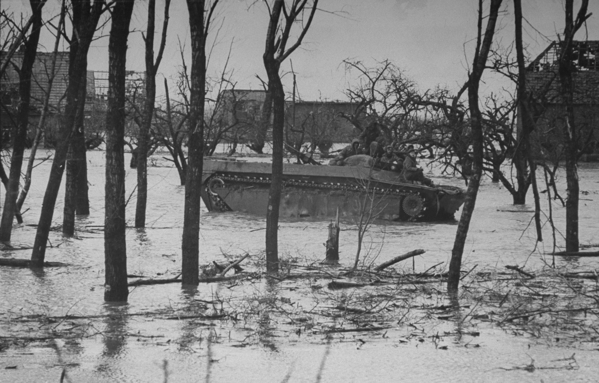 An Allied tank in flood waters unleashed by Germans, as a defensive maneuver, in the Netherlands, 1945.