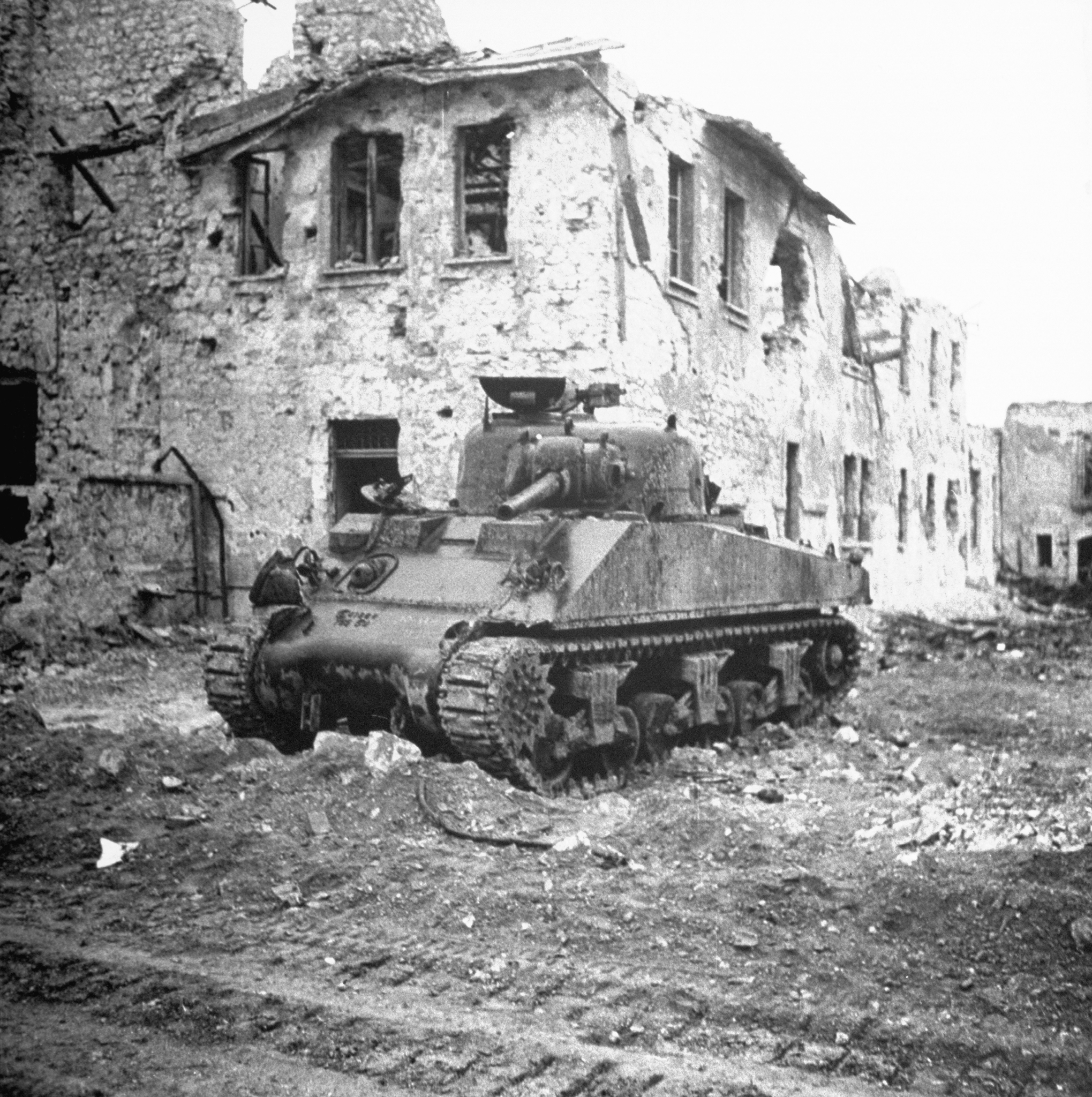 Disabled American M4 Sherman tank near Cassino, Italy, 1944.