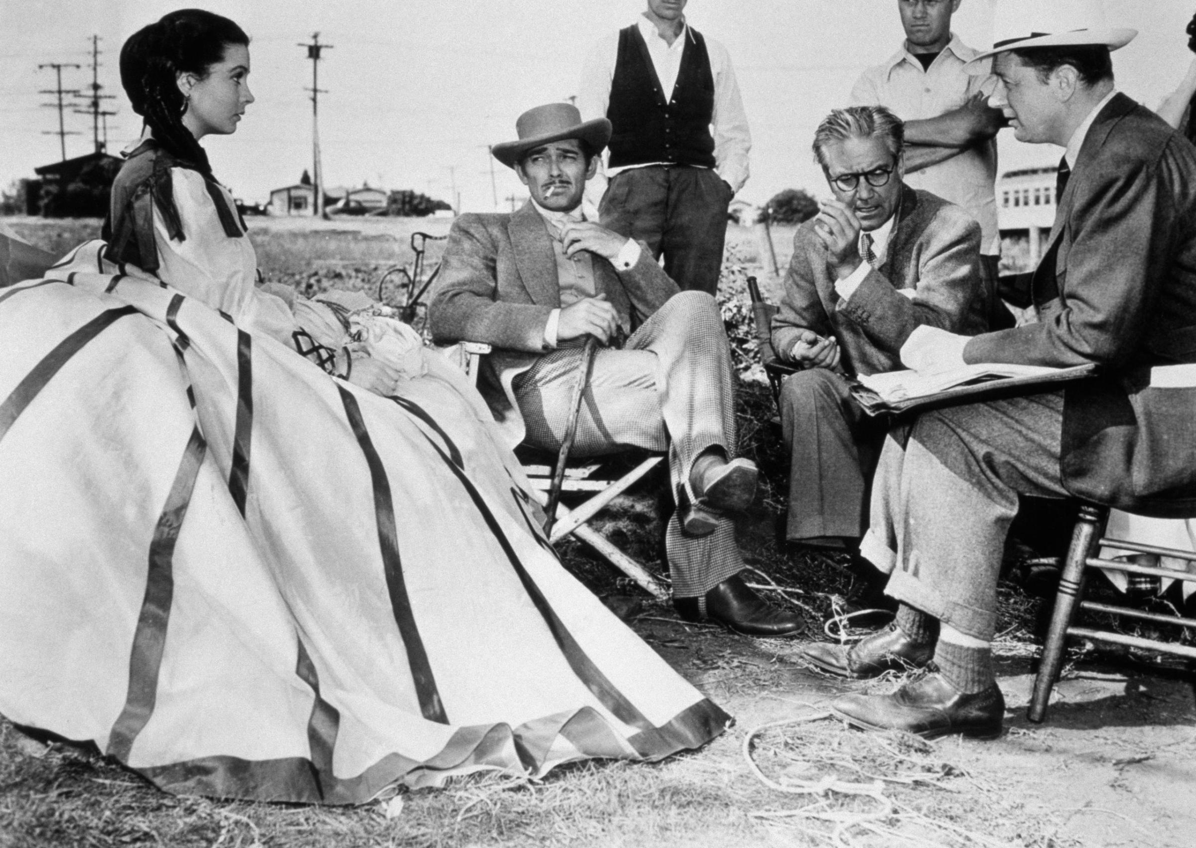 Leigh, Gable and Fleming take a breather on set