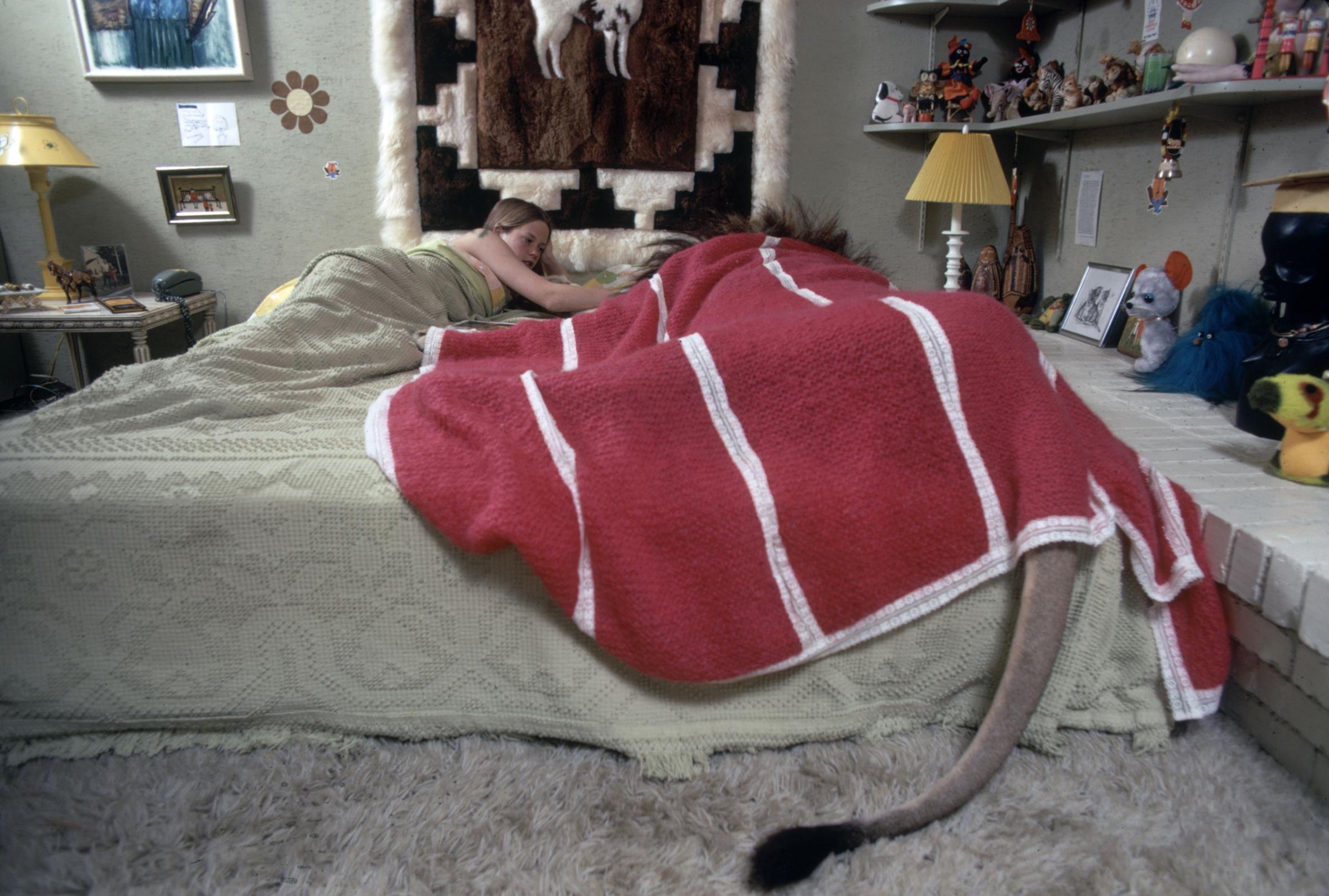 Melanie Griffith in bed with Neil the lion, 1971.