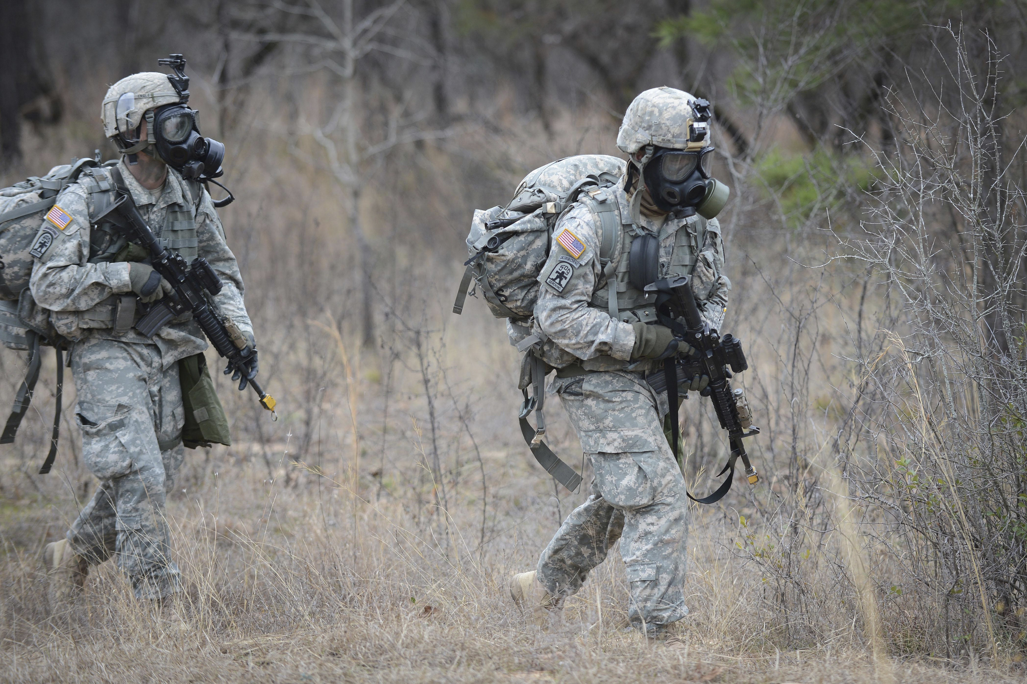 U.S. soldiers don chemical warfare gear. (Stocktrek Images—Getty Images/Stocktrek Images)