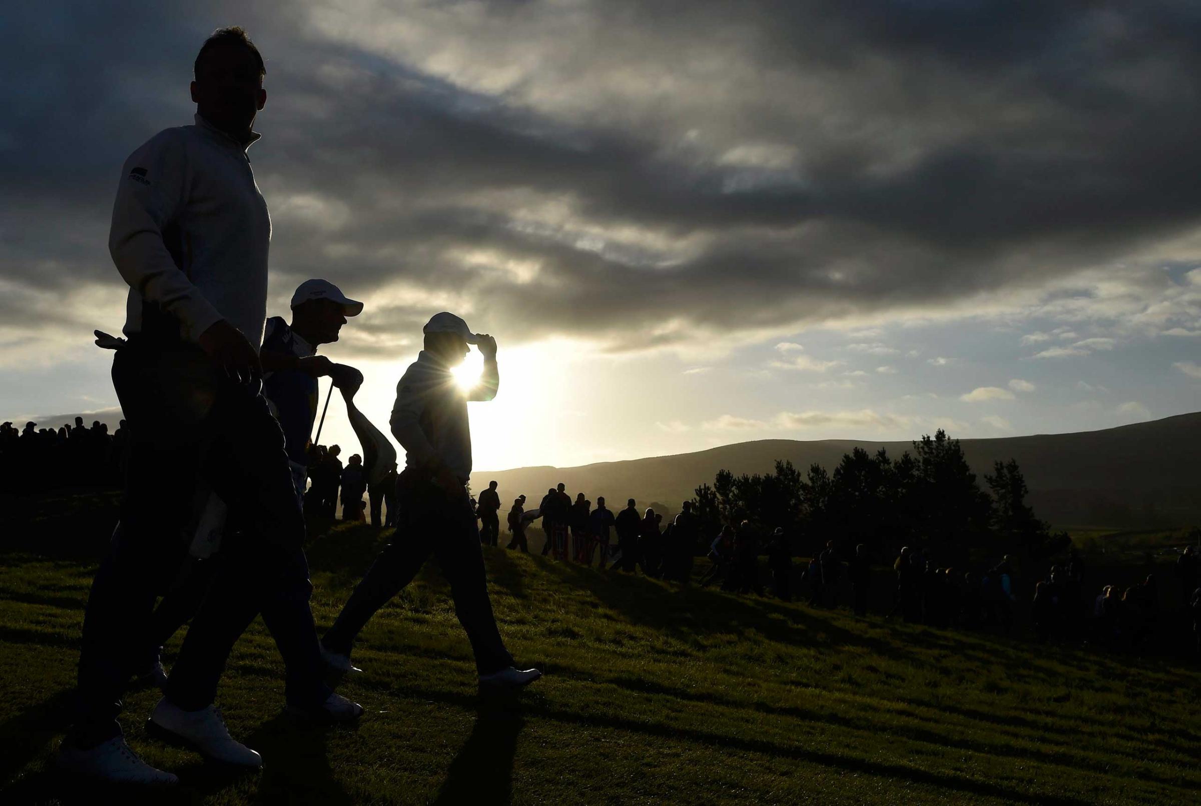 European Ryder Cup players Jamie Donaldson and Lee Westwood walk along the fairway during their fourballs 40th Ryder Cup match at Gleneagles