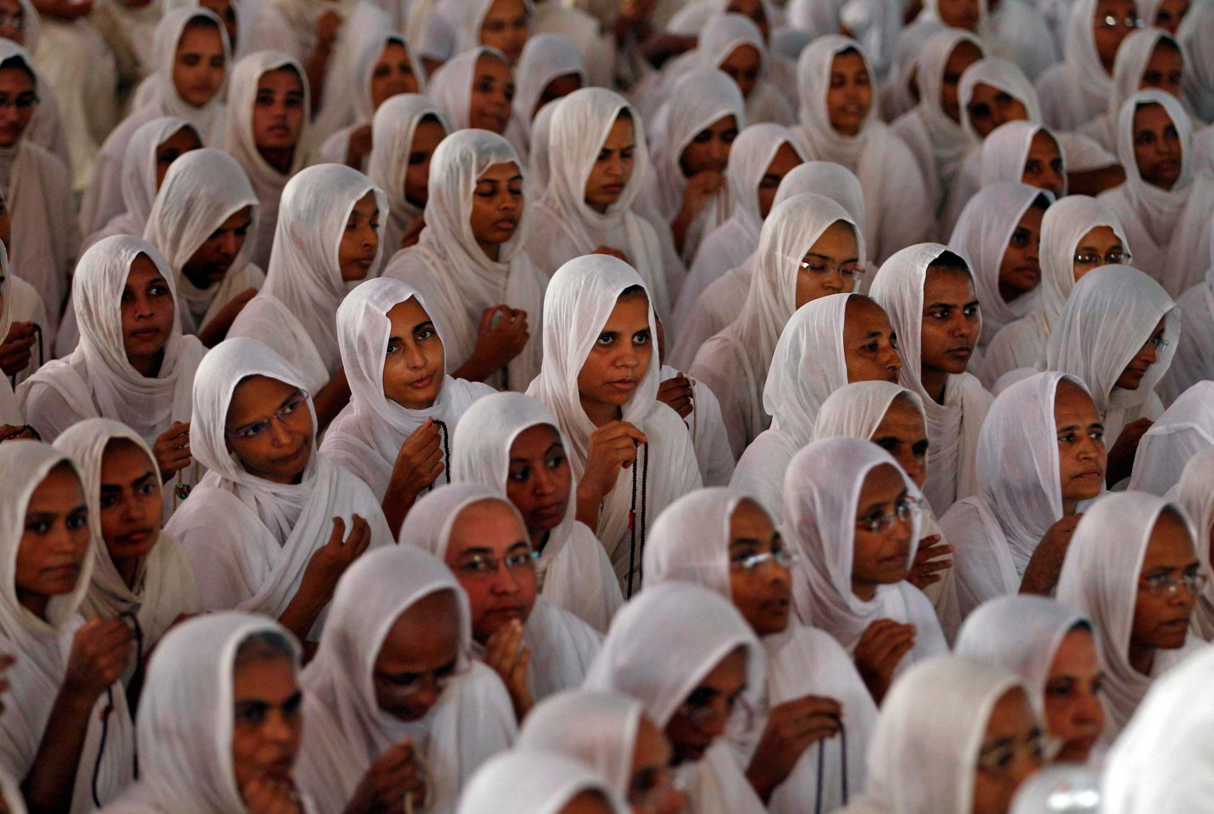 Women from the Jain community attend a prayer meeting for world peace in Ahmedabad