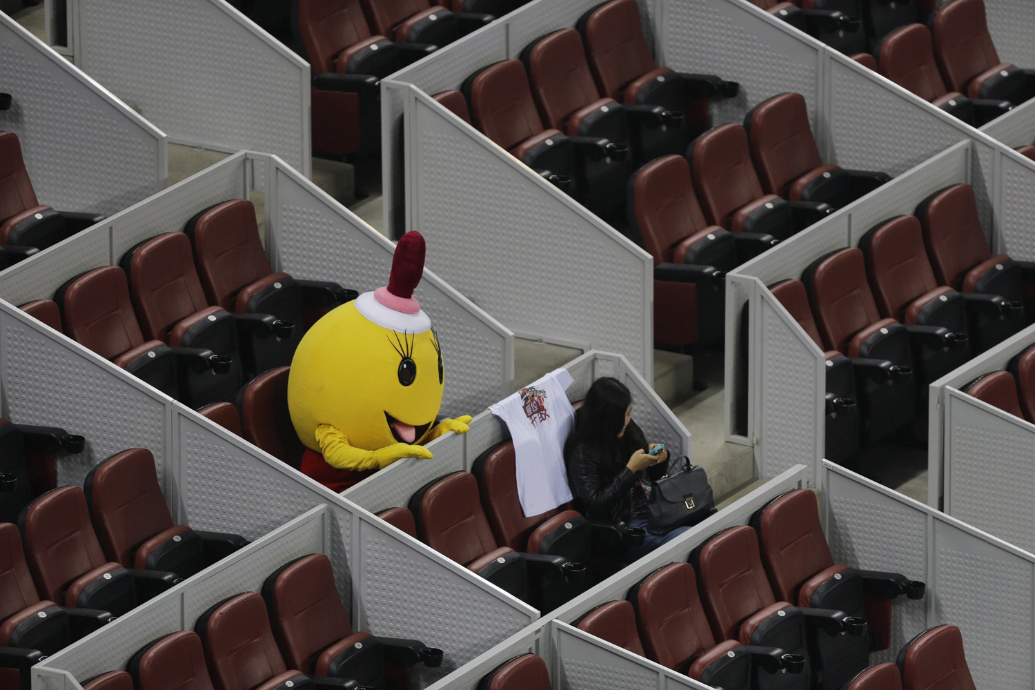 Costumed mascot waits for the men's quarter-final match between Nadal of Spain and Klizan of Slovakia at the China Open tennis tournament in Beijing