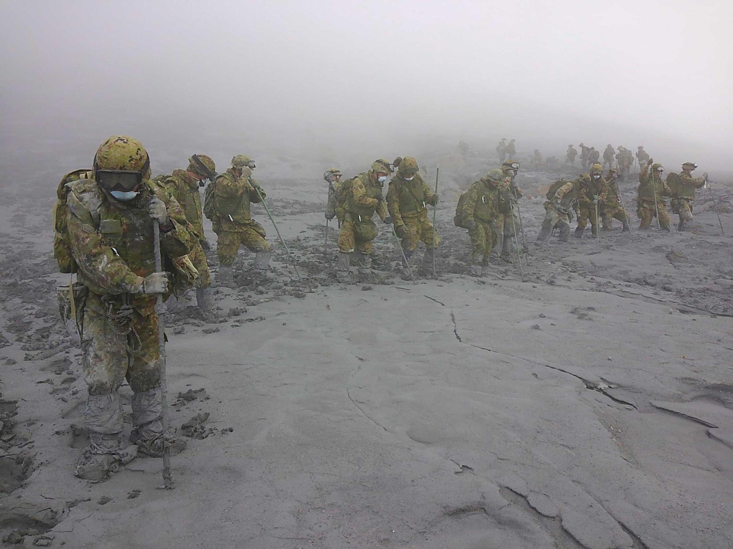 JSDF soldiers conduct rescue operations on Mount Ontake, which erupted on September 27, 2014 and straddles Nagano and Gifu prefectures in central Japan