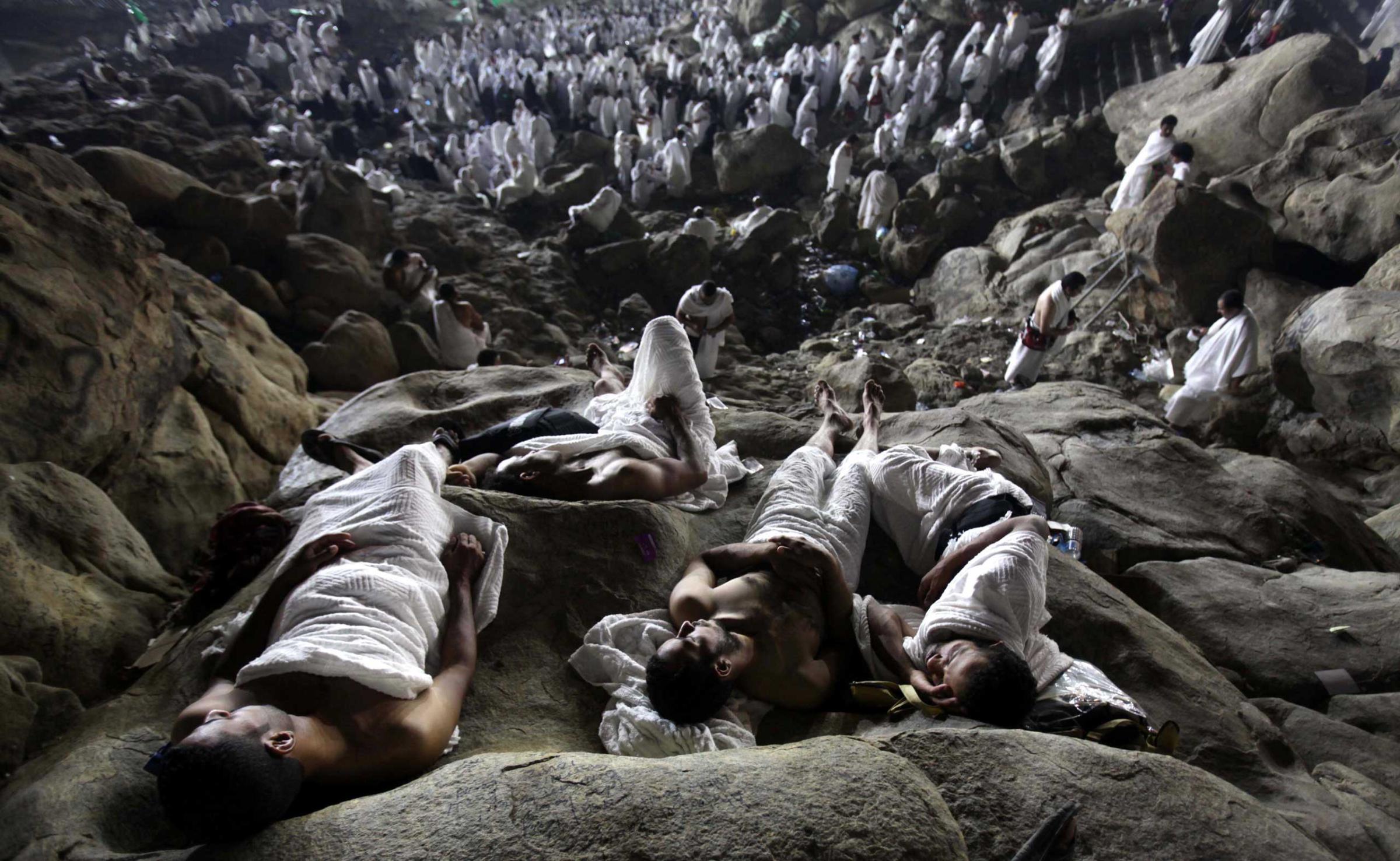 MUSLIM PILGRIMS GATHER ON MOUNT ARAFAT, NEAR MECCA, AS THEY TAKE PART IN ONE OF THE HAJJ RITUALS