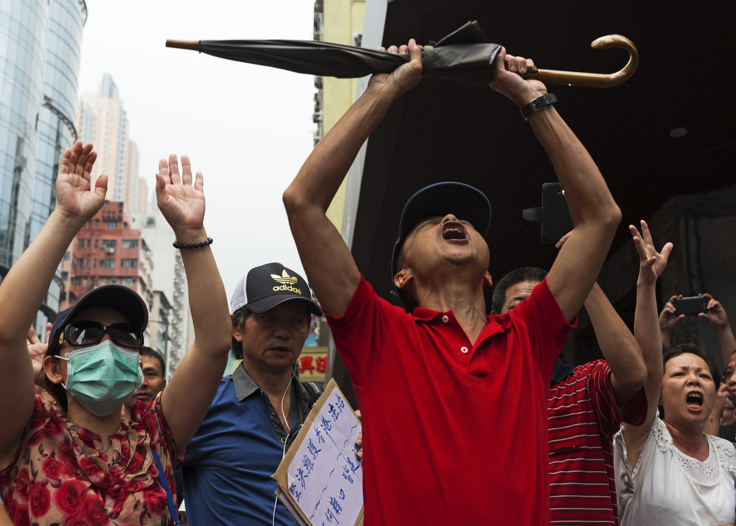 A counter protest group in Mongkok during democracy demonstrations in the Mong Kong district of Hong Kong.