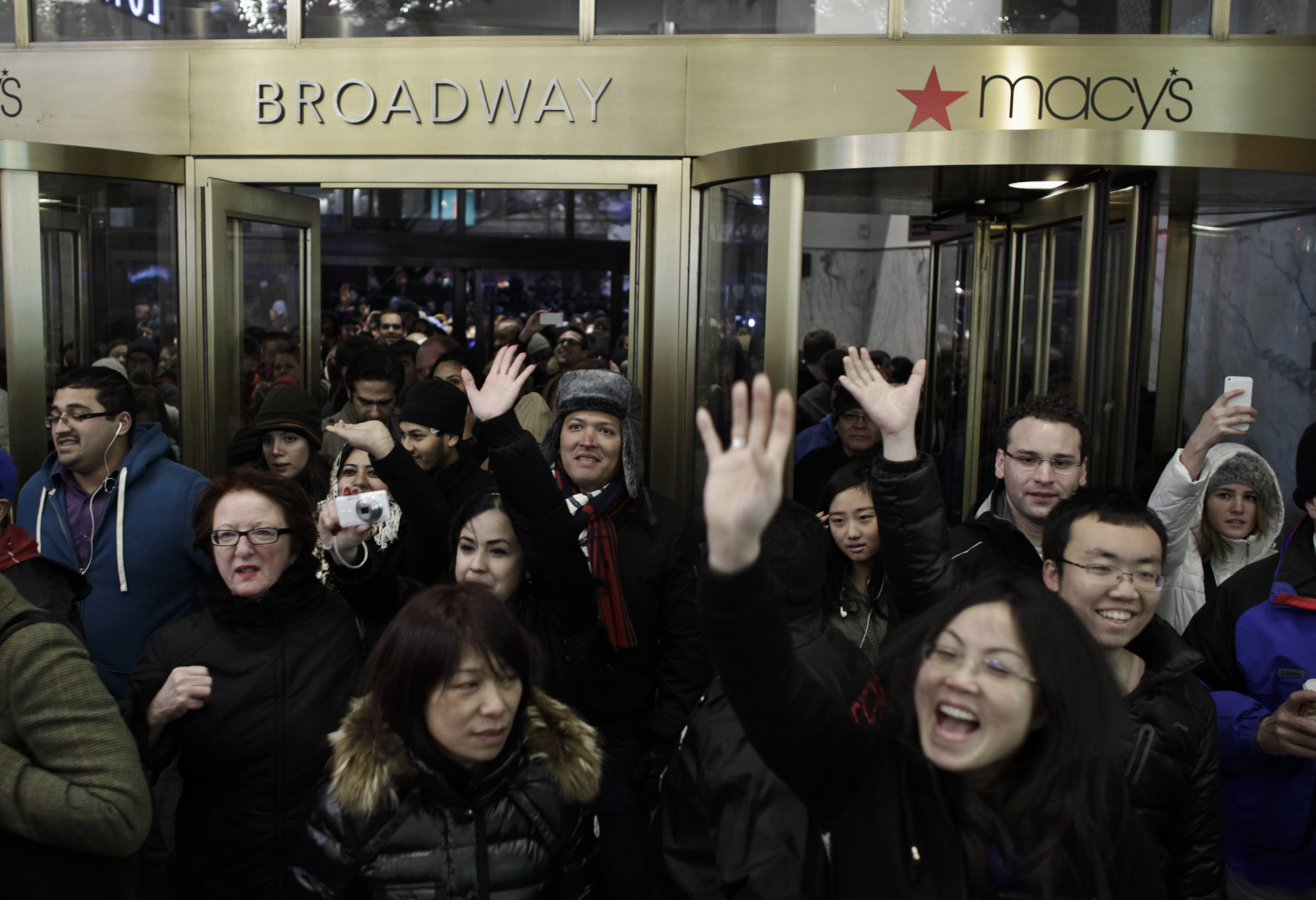 People enter Macy's Herald Square as the store opens its doors at 8 pm Thanksgiving day on November 28, 2013 in New York City (Kena Betancur&mdash;Getty Images)