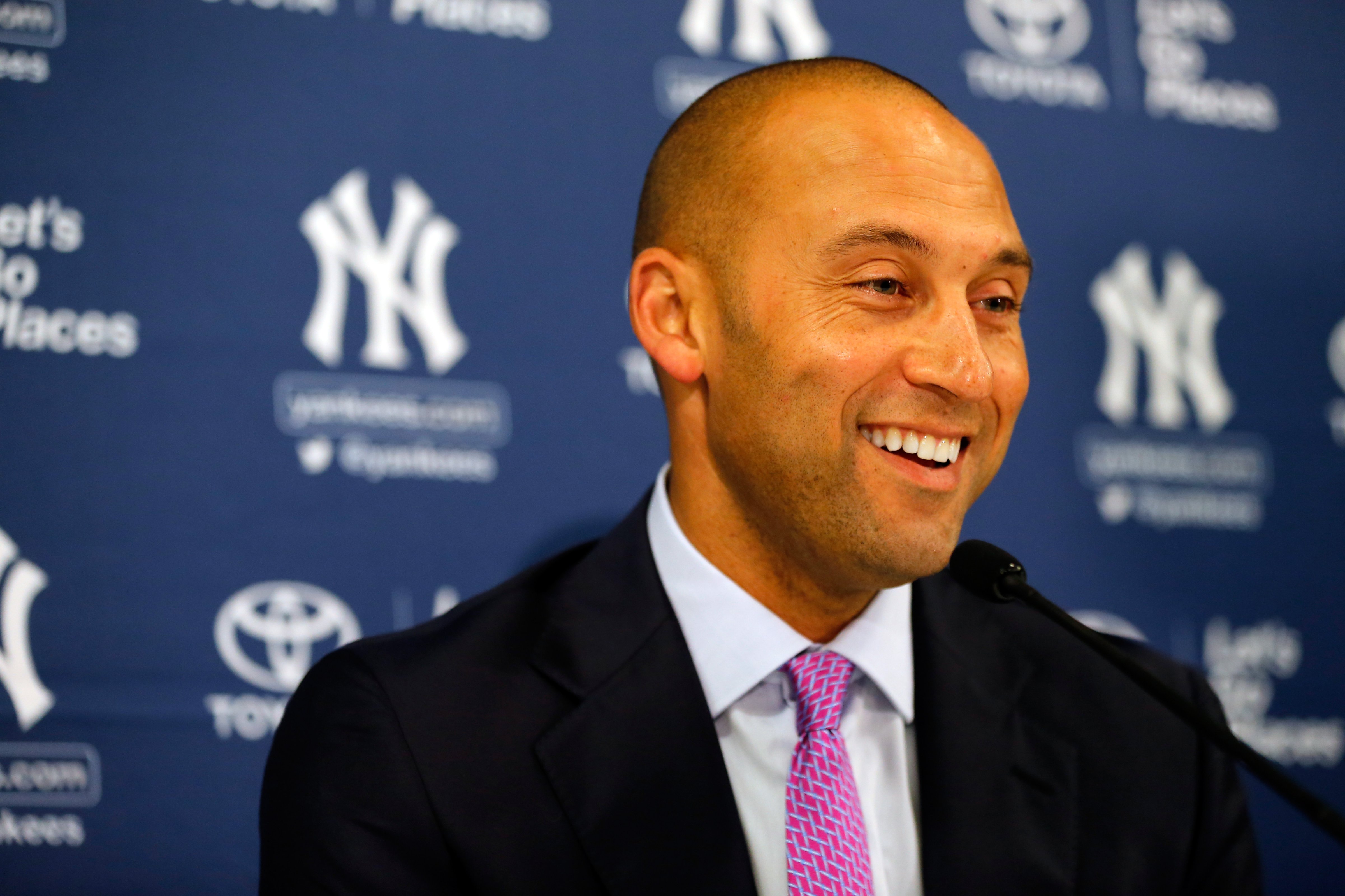 Derek Jeter speaks to the media following his last career game against the Boston Red Sox at Fenway Park on September 28, 2014 in Boston. (Jim Rogash&mdash;Getty Images)