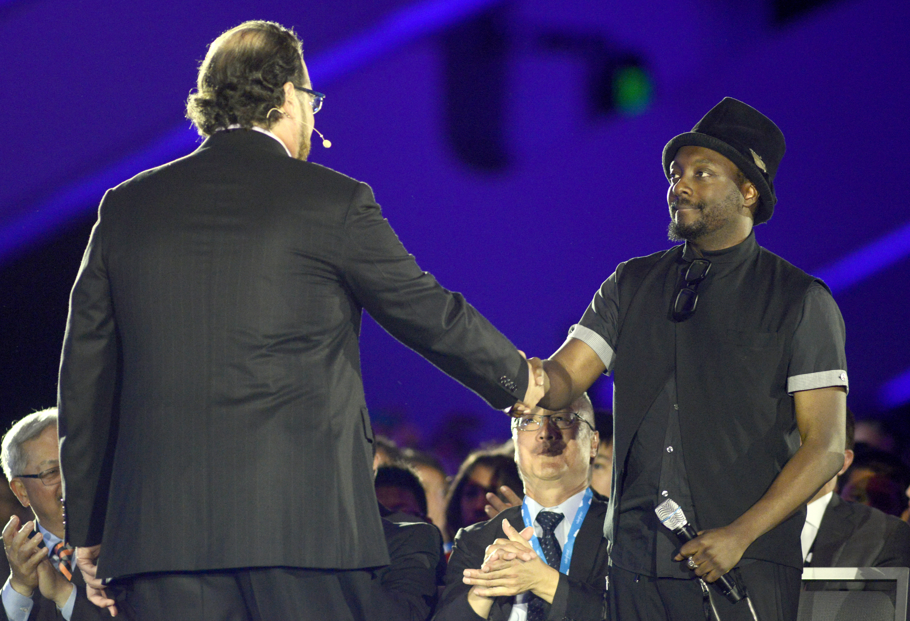 Marc Benioff (left) and will.i.am participate in the keynote speech at Salesforce.com's Dreamforce 2014 Conference. (Tim Mosenfelder&mdash;Getty Images)