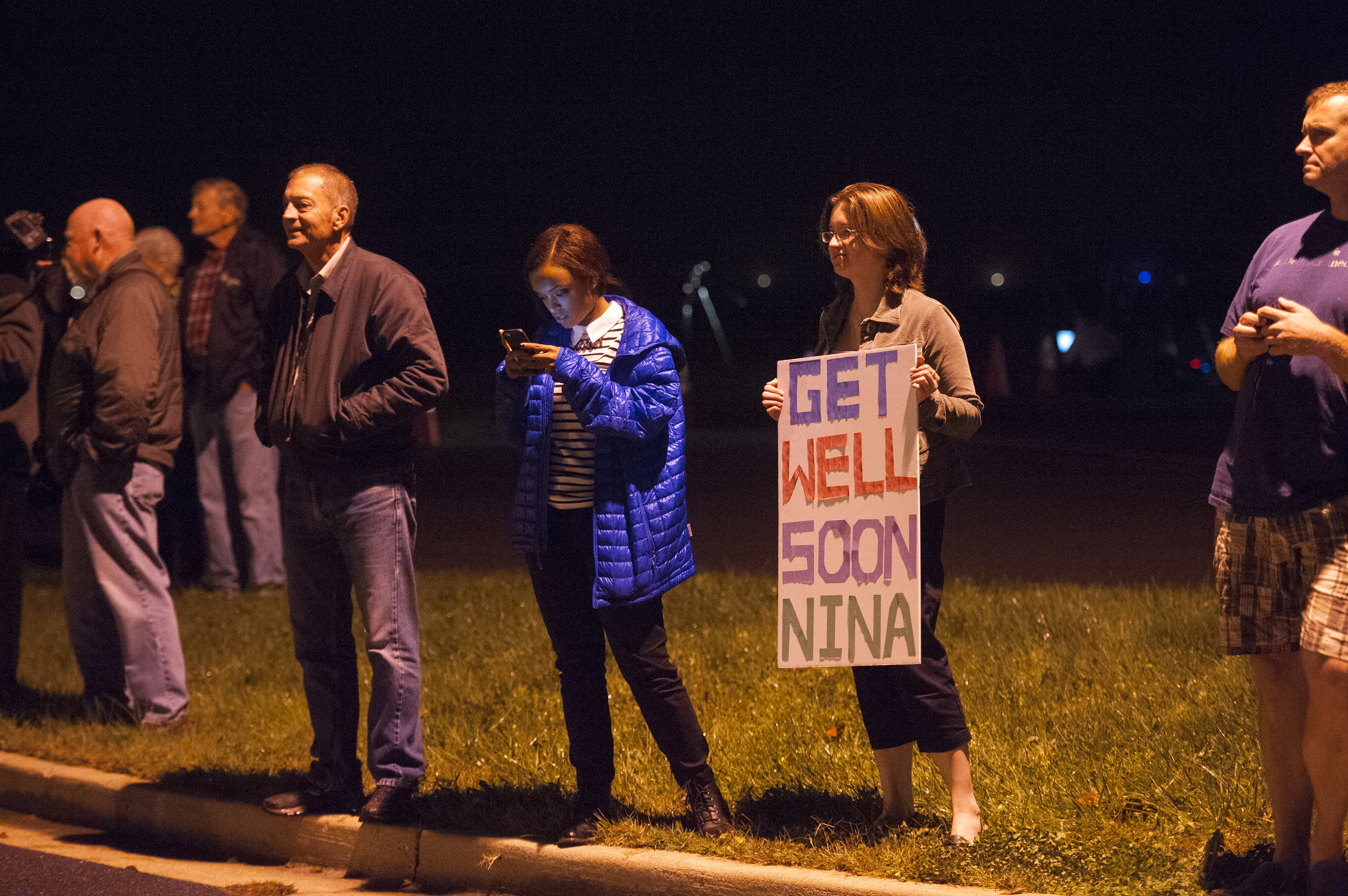 Ashley King of Walkersville came out to send a positive message to Nina Pham, a nurse who treated Thomas Duncan, the Liberian man, who died of Ebola,  who was flown into Frederick Airport and transferred to NIH to treat her now that she has Ebola October 16, 2014 in Frederick, Maryland. (The Washington Post/Getty Images)