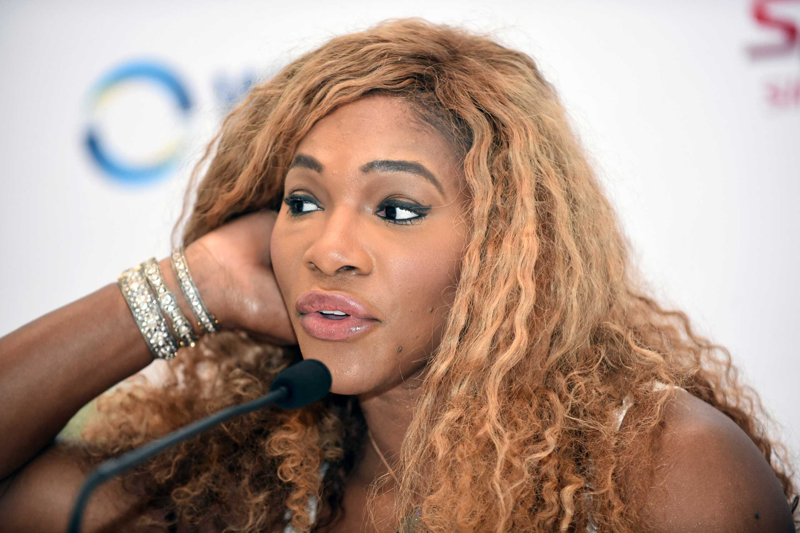 World number one Serena Williams of the US attends a press conference ahead of the Women's Tennis Association (WTA) championships in Singapore on October 19, 2014. World number one Serena Williams lashed out at "sexist" and racist" comments from the head of Russian tennis October 19 after he jokingly called her and her sister Venus the "Williams brothers". AFP PHOTO / ROSLAN RAHMAN        (Photo credit should read ROSLAN RAHMAN/AFP/Getty Images) (ROSLAN RAHMAN&mdash;AFP/Getty Images)