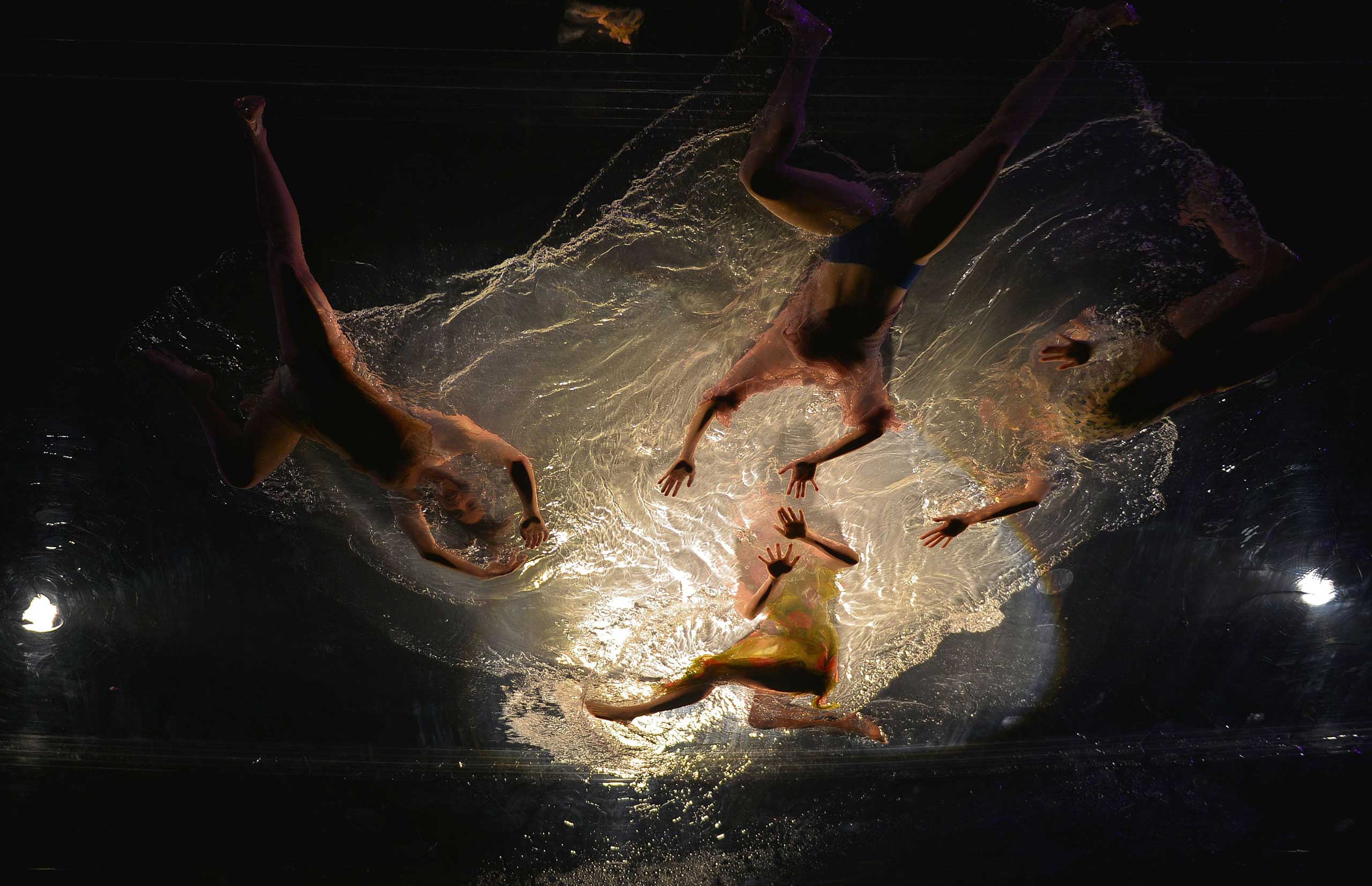 Oct. 22, 2014. Actors perform at the MixC Shopping Mall  in Chongqing, China. The  Fuerzabruta  held its first show for the next 30 formal performances within three weeks in Chongqing.  Fuerzabruta  is a creative show together with music, drama, dance, and blasting performance.