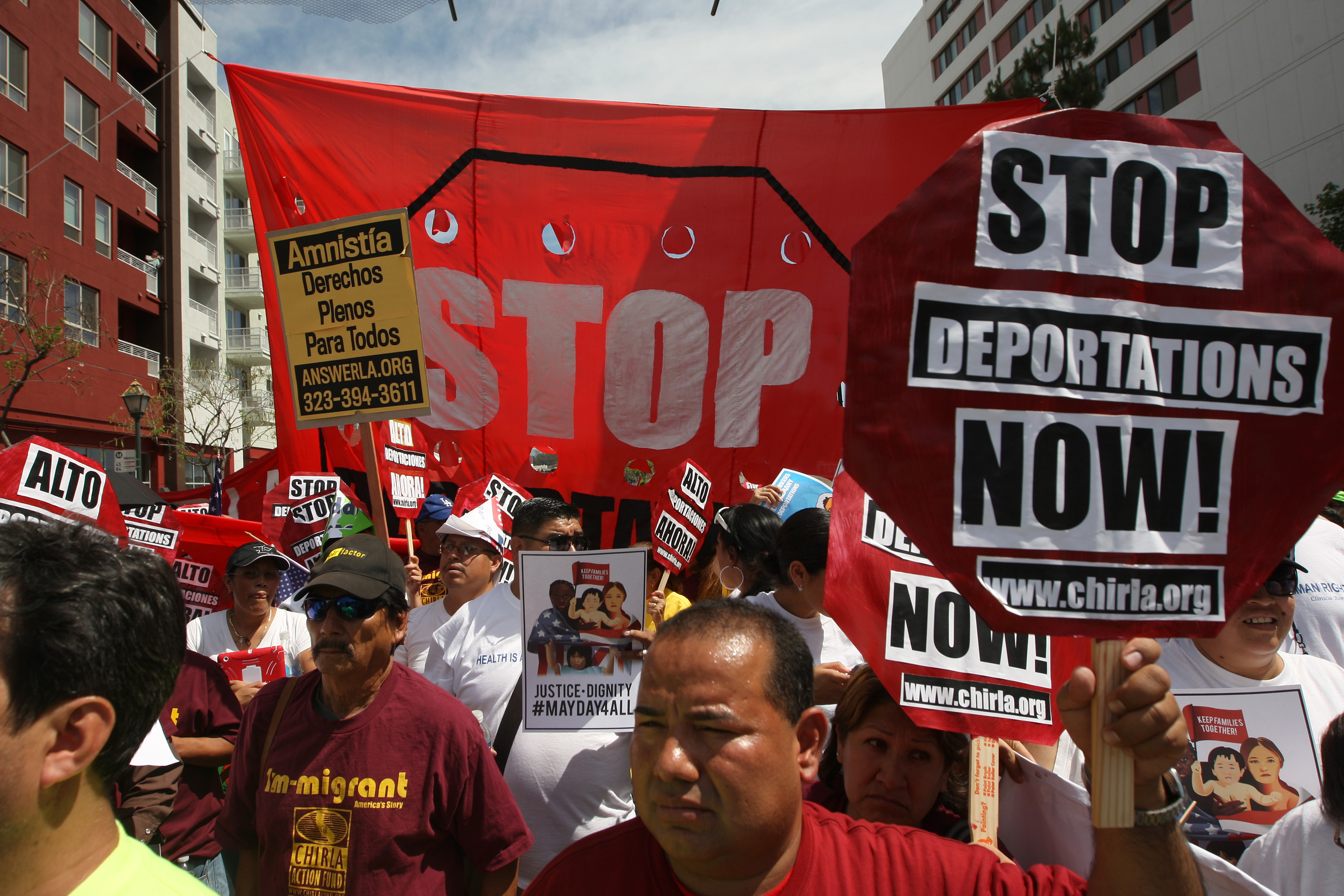 Marchers rally under the Chinatown Gateway before marching to the Metropolitan Detention Center during one a several May Day immigration-themed events on May 1, 2014 in Los Angeles, California. Demonstrators are calling for immigration reform and an end to deportations of undocumented residents. (David McNew&mdash;Getty Images)