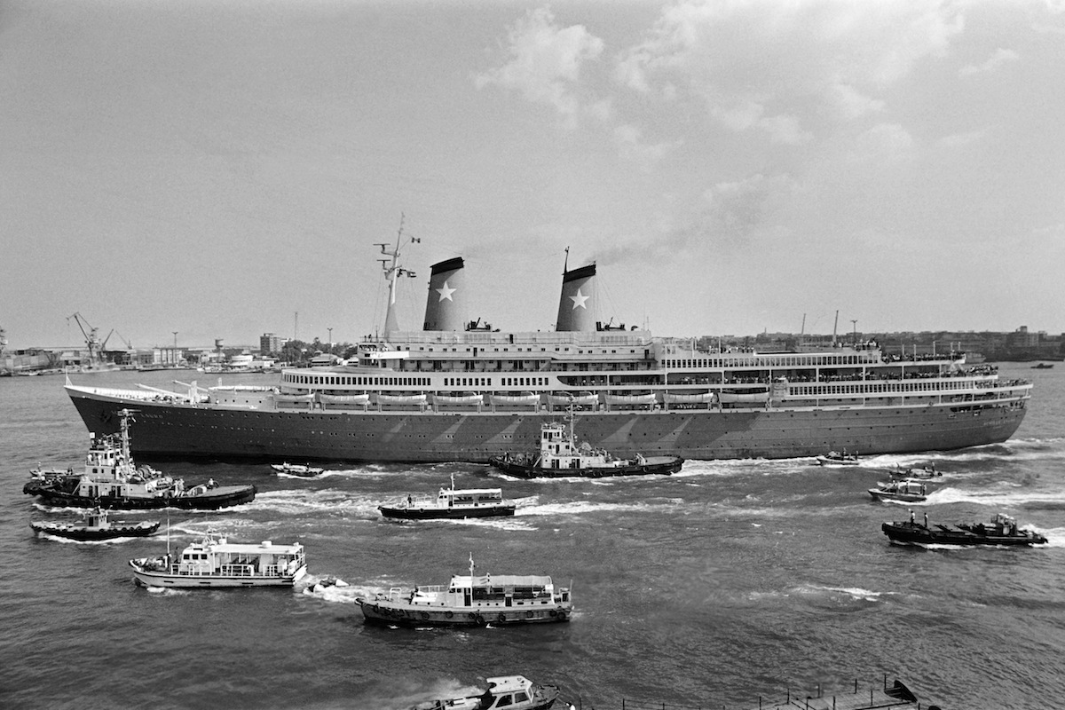 Italian cruise ship Achille Lauro leaves Port Said harbor on Oct. 10, 1985 after Egyptian authorities stopped it from sailing to the Israeli port of Ashdod. (Mike Nelson — AFP/Getty Images)