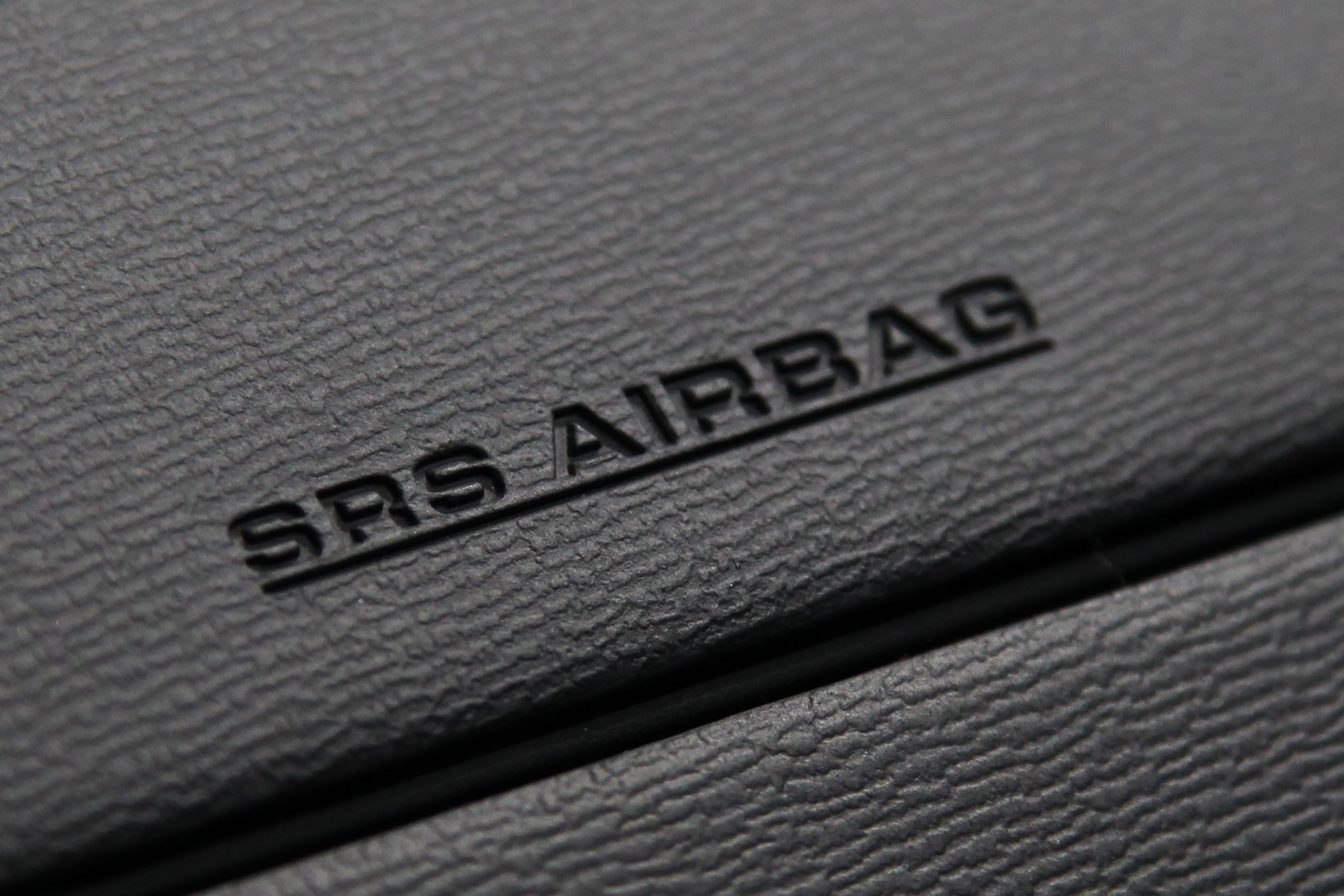 The airbag unit for the passenger seat of a Toyota Motor Corp. vehicle is seen at the company's showroom in Tokyo, Japan, on Thursday, April 11, 2013. (Bloomberg&mdash;Bloomberg via Getty Images)