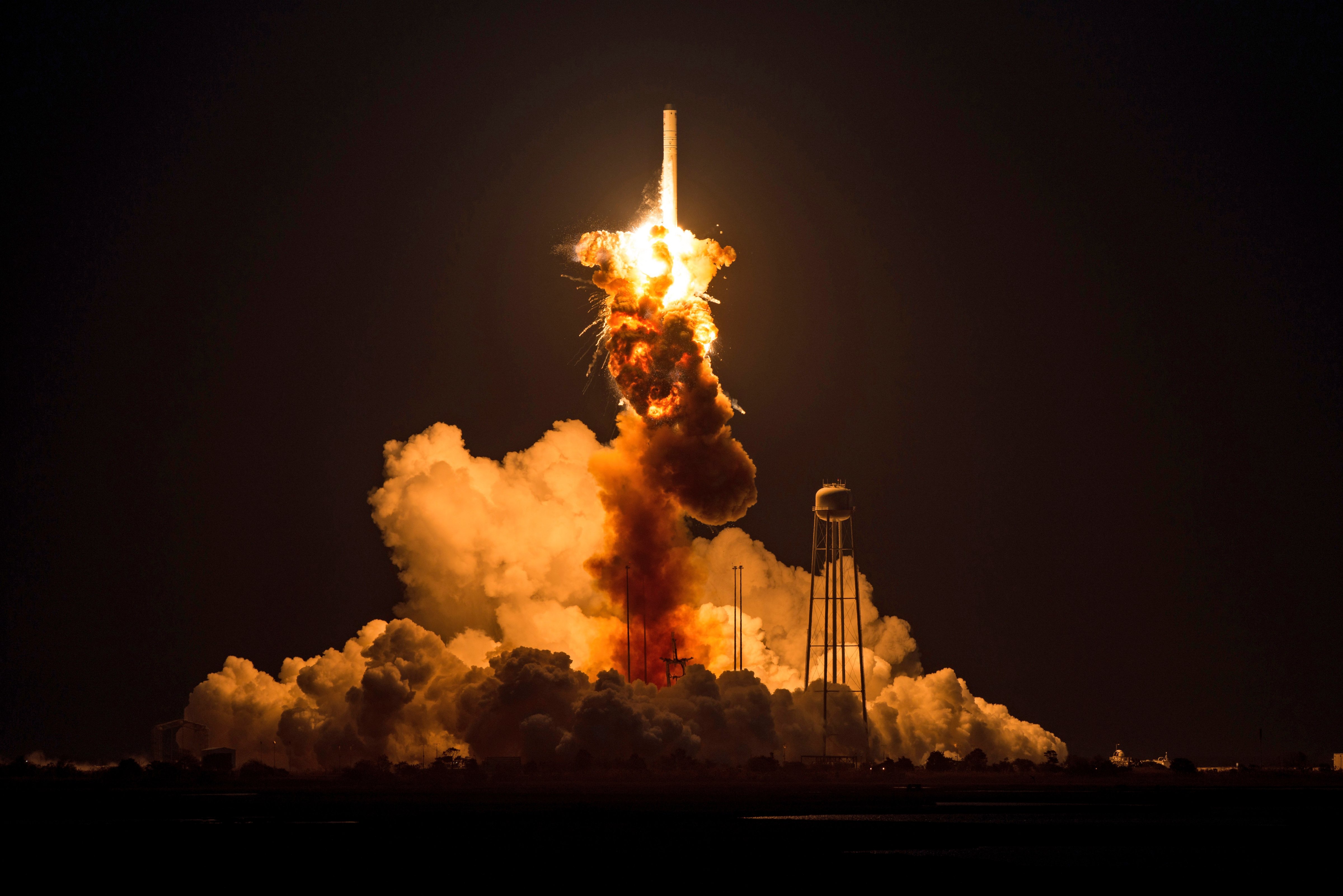 This image provided by NASA shows the Orbital Sciences Corporation Antares rocket, with the Cygnus spacecraft onboard suffers a catastrophic anomaly moments after launch from the Mid-Atlantic Regional Spaceport Pad 0A, Tuesday, Oct. 28, 2014, at NASA's Wallops Flight Facility in Virginia. (Joel Kowsky—AP)