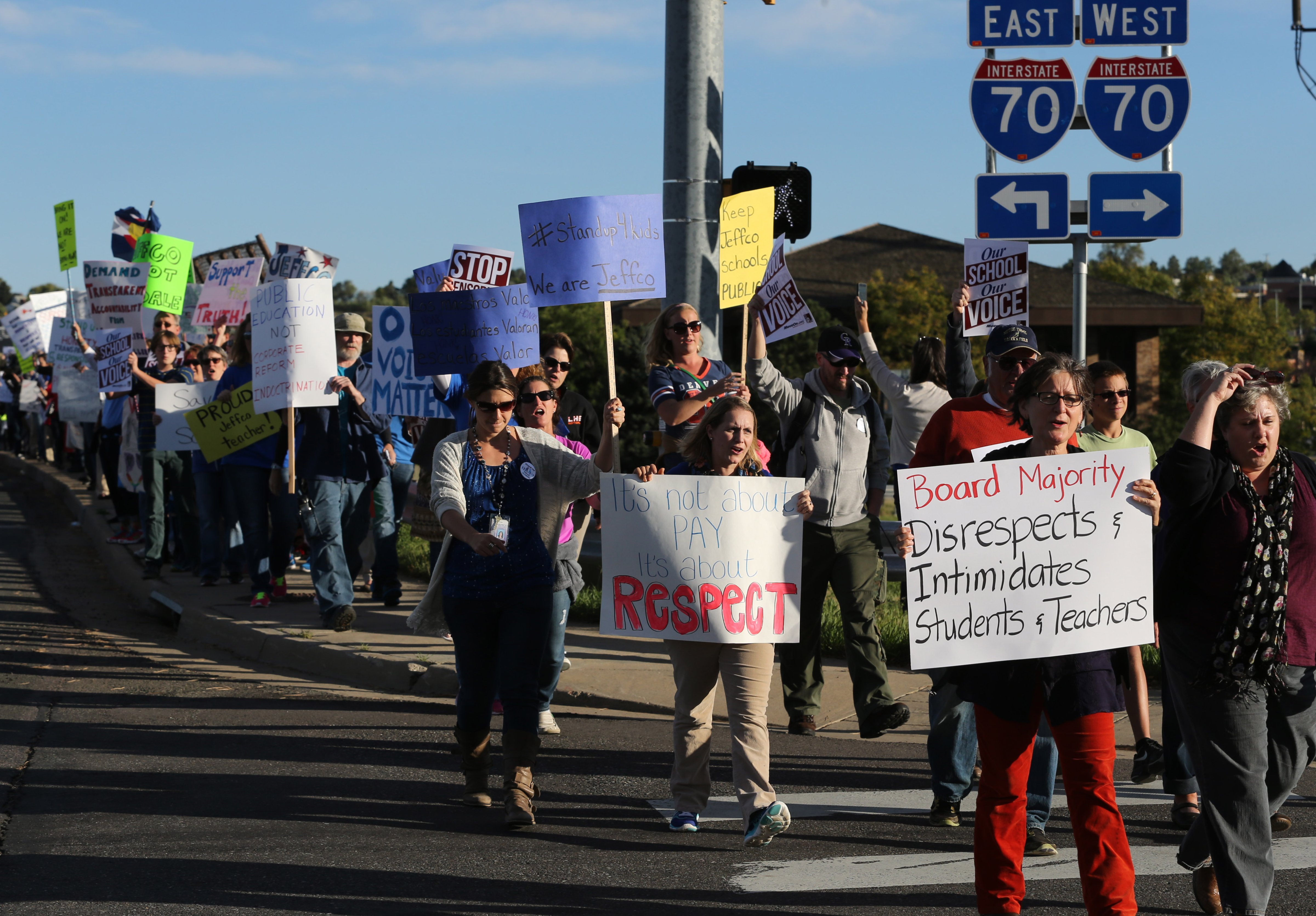 Teachers, students and supporters march near the location of an ongoing Jefferson County School Board meeting, in Golden, Colo., Thursday, Oct. 2, 2014. (Brennan Linsley—AP)