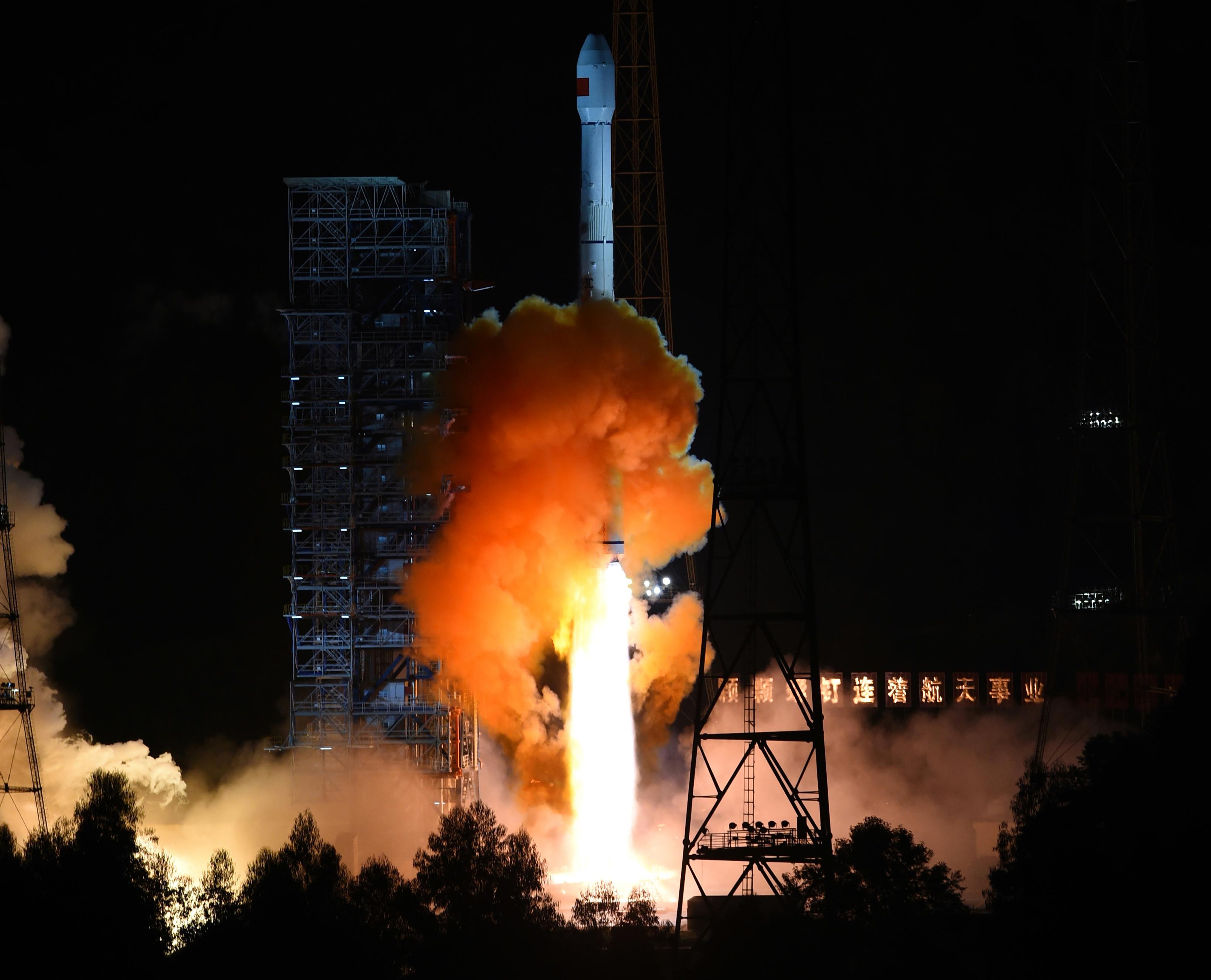 An unmanned spacecraft is launched from the Xichang Satellite Launch Center in southwest China's Sichuan Province on Oct. 24, 2014 (Jiang Hongjing—AP)