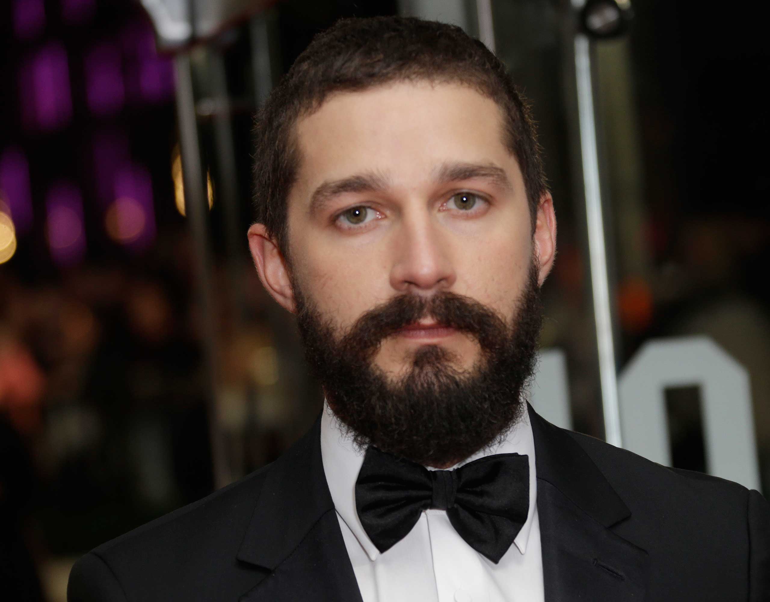 Shia LaBeouf poses for photographers at a film premiere in London, Oct. 19, 2014. (Joel Ryan—Invision/AP)