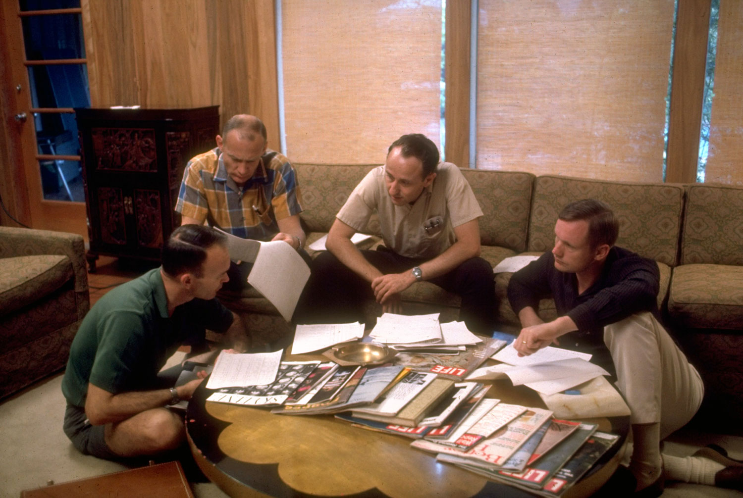Not published in LIFE. The Apollo 11 astronauts discuss their upcoming moon mission with an engineer from Houston's Mission Control Center (second from right), Texas, 1969.