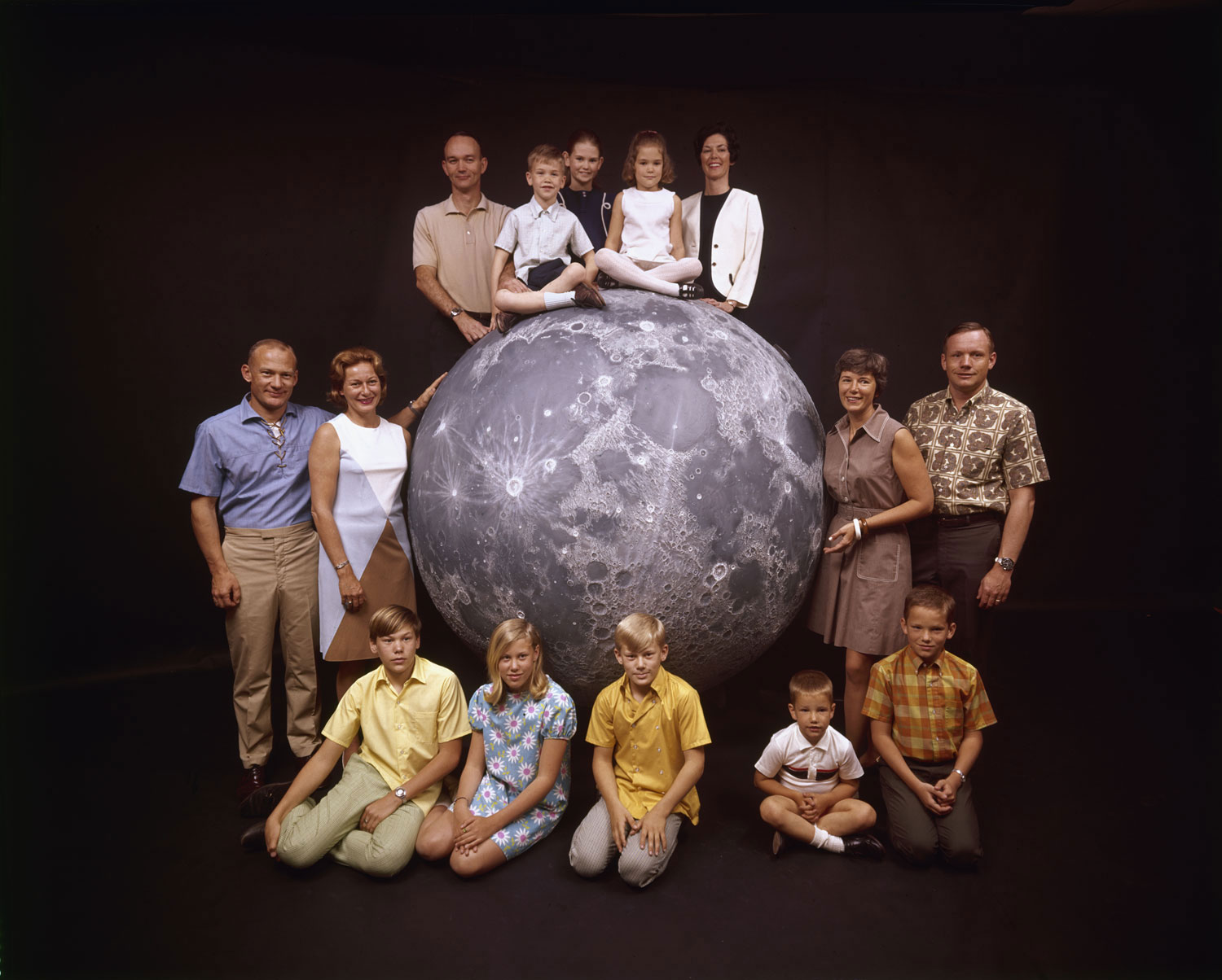 Not published in LIFE. The Apollo 11 astronauts and their families pose with a scale model of the moon, spring 1969.
