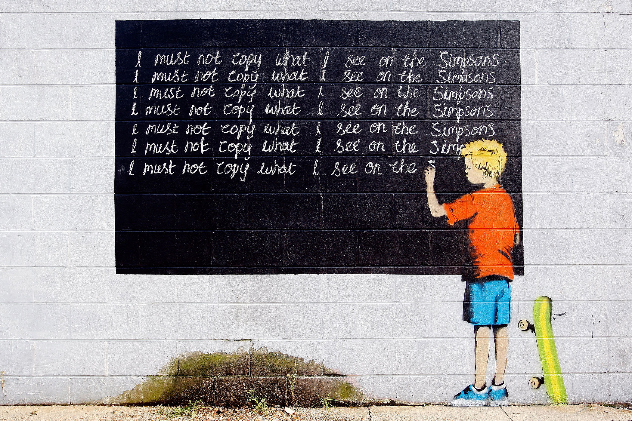 Banksy Graffiti Murals Pop Up Around New Orleans, Including Levee Wall
