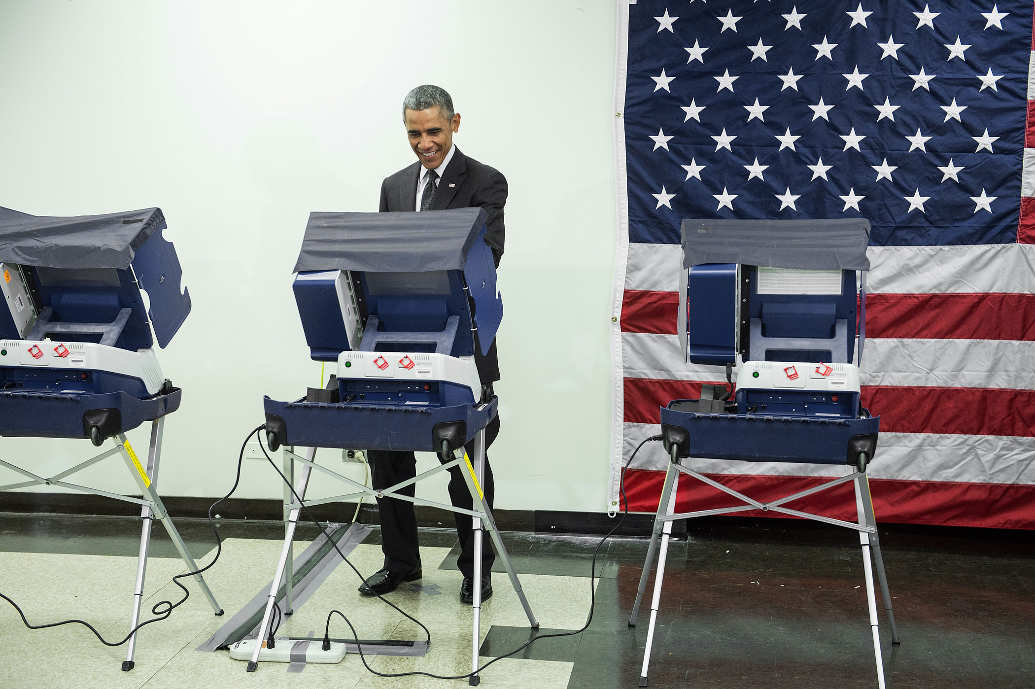 President Barack Obama casts a ballot in early voting for the 2014 midterm elections at the Dr. Martin Luther King Community Service Center October 20, 2014 in Chicago, Illinois. (Brendan Smialowski—AFP/Getty Images)