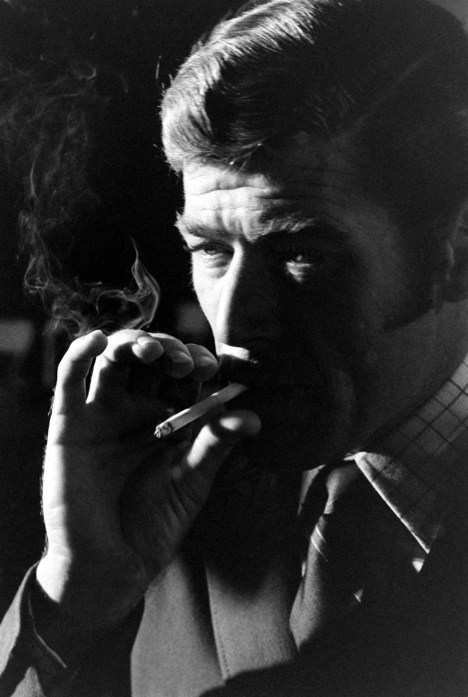 Anthony Rogers smokes a cigarette during his James Bond audition, 1967.