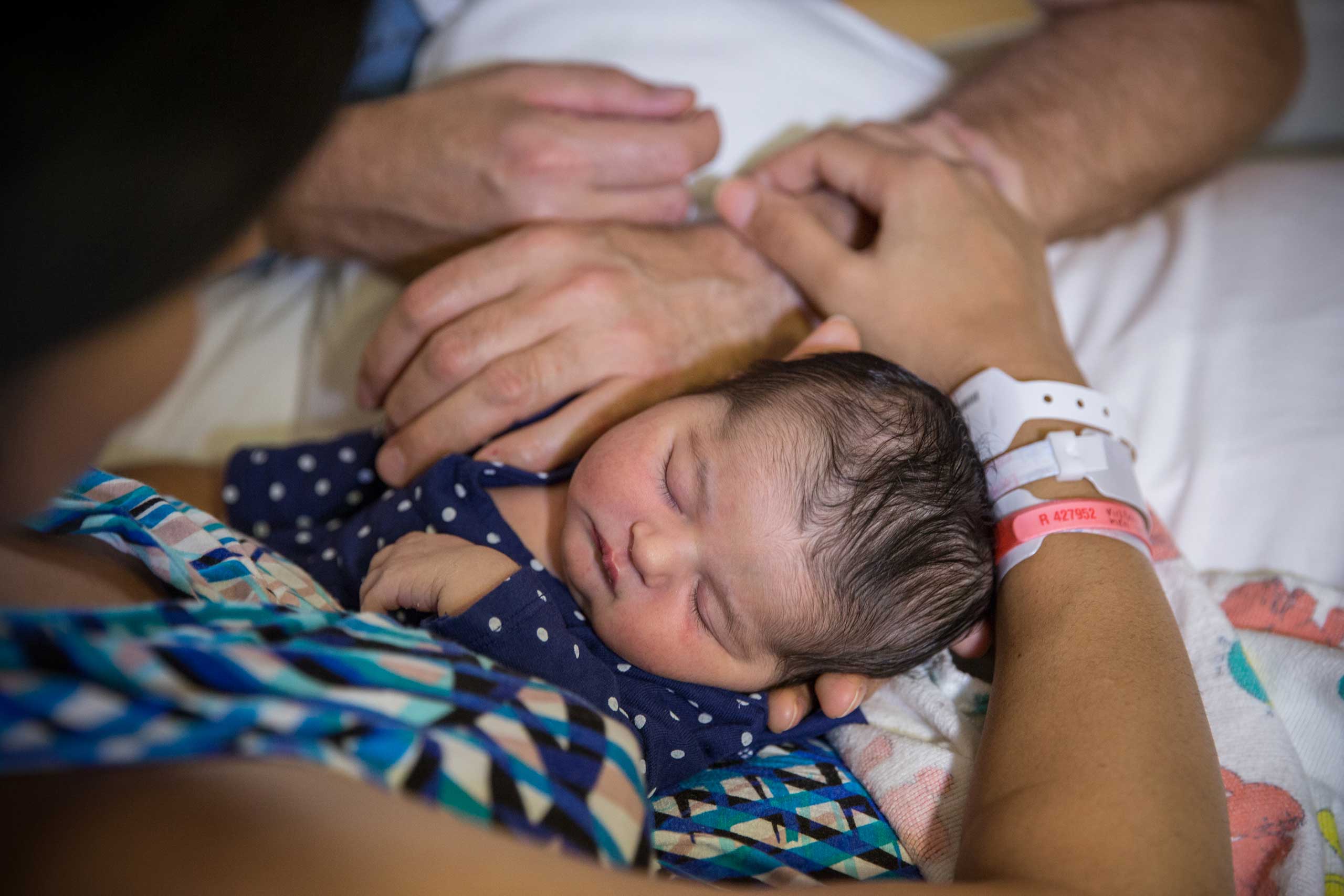 A three-day old baby girl at Shady Grove Adventist Hospital, in Rockville, Maryland, Sept. 5, 2014. (Evelyn Hockstein—The Washington Post/Getty Images)