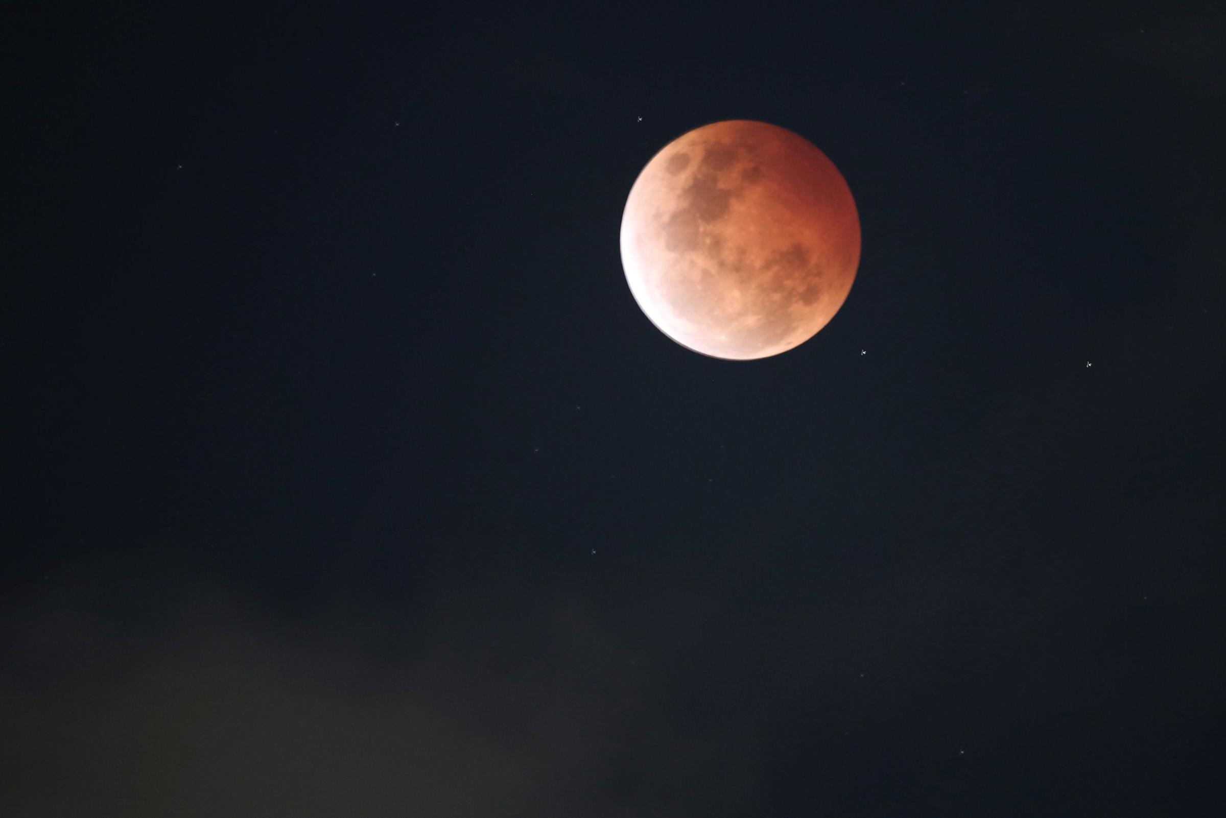 The moon during a total lunar eclipse over Sydney, on Oct. 8, 2014.