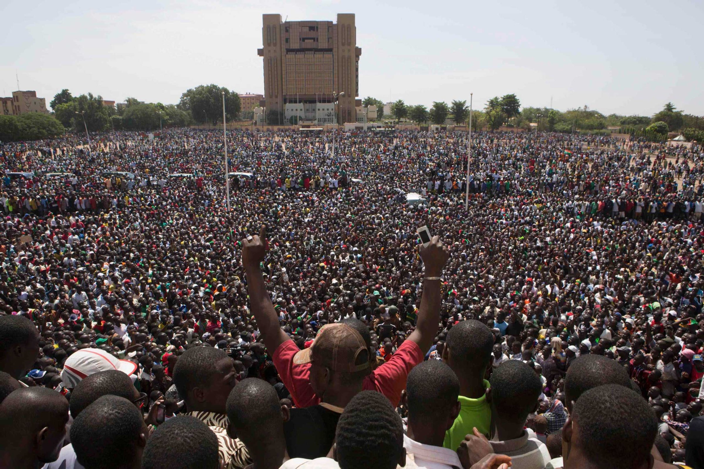 Anti-government protesters gather in the Place de la Nation in Ouagadougou, capital of Burkina Faso, Oct. 31, 2014.