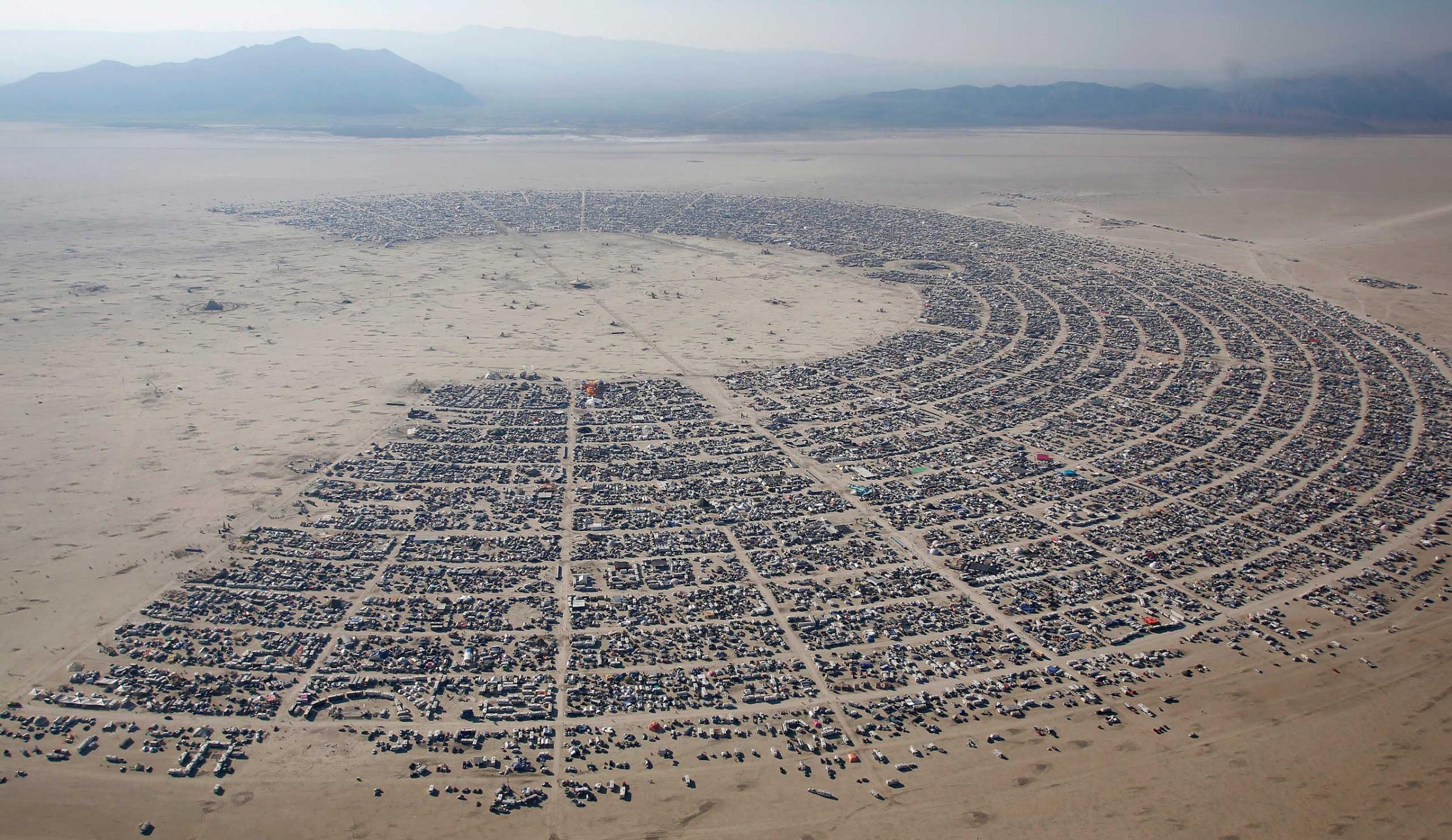 An aerial view of the Burning Man 2013 arts and music festival is seen in the Black Rock Desert of Nevada