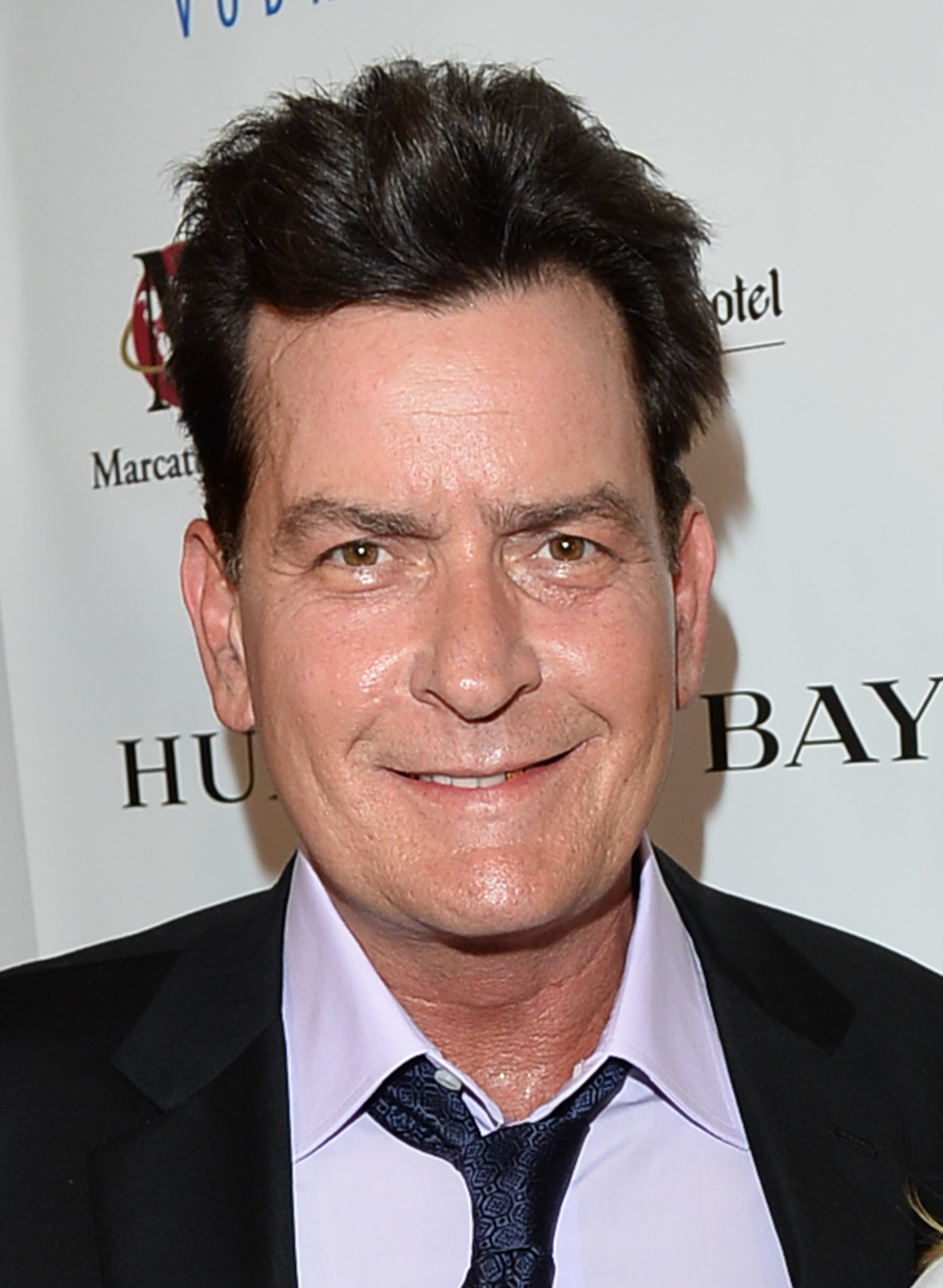 Actor Charlie Sheen attends the Joe Carter Classic Charity Golf Tournament after-party at Shangri-La Hotel on June 26, 2014 in Toronto. (George Pimentel—WireImage/Getty Images)