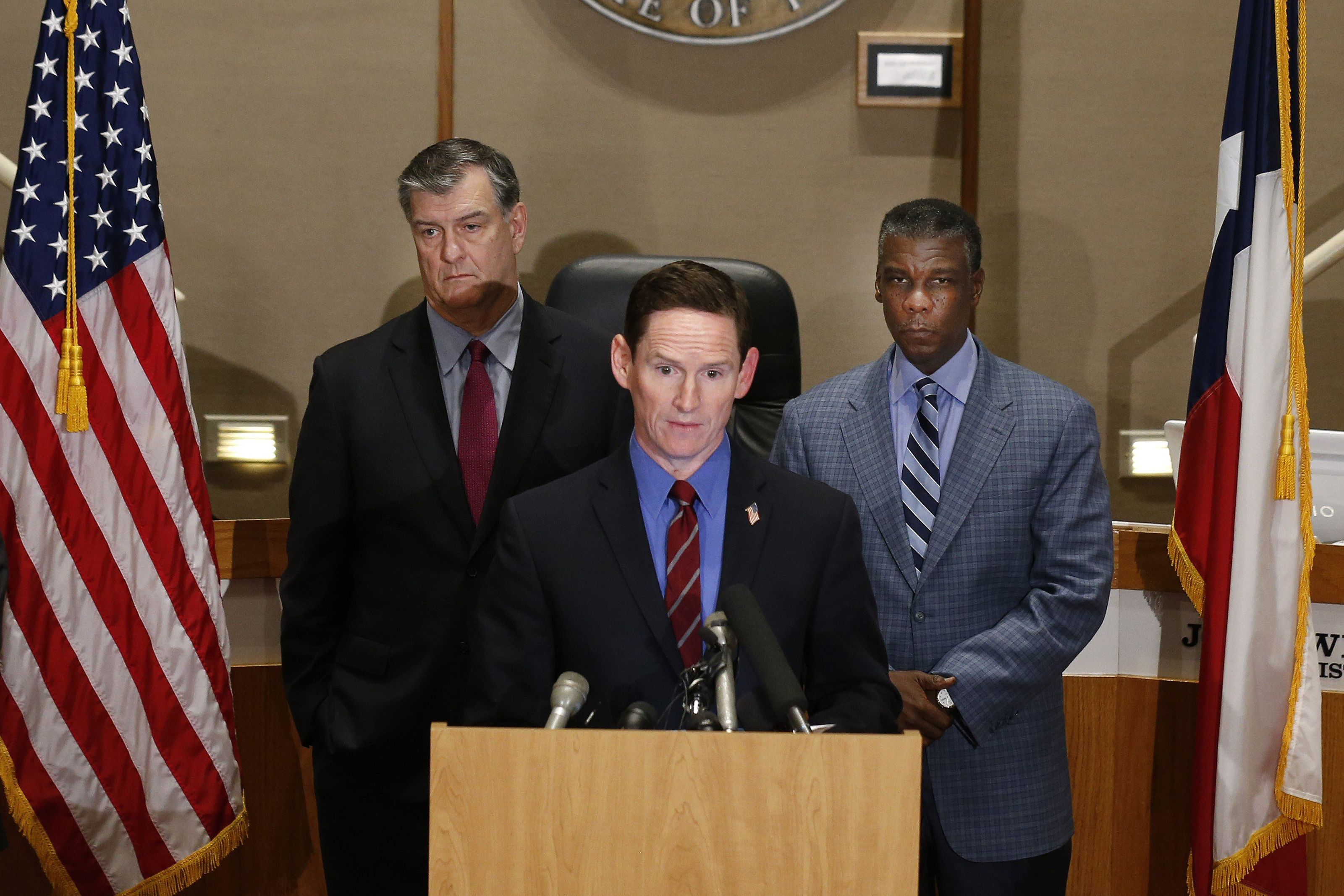 Dr. Daniel Varga, Chief Clinical Officer, Senior Executive Vice President, Dallas Mayor Mike Rawlings, Dallas County Judge Clay Jenkins and Dallas County Human and Health Service Director Zach Thompson held a news conference about the new Ebola case on Oct. 15, 2014 at Dallas County Commissioners Court in Dallas.