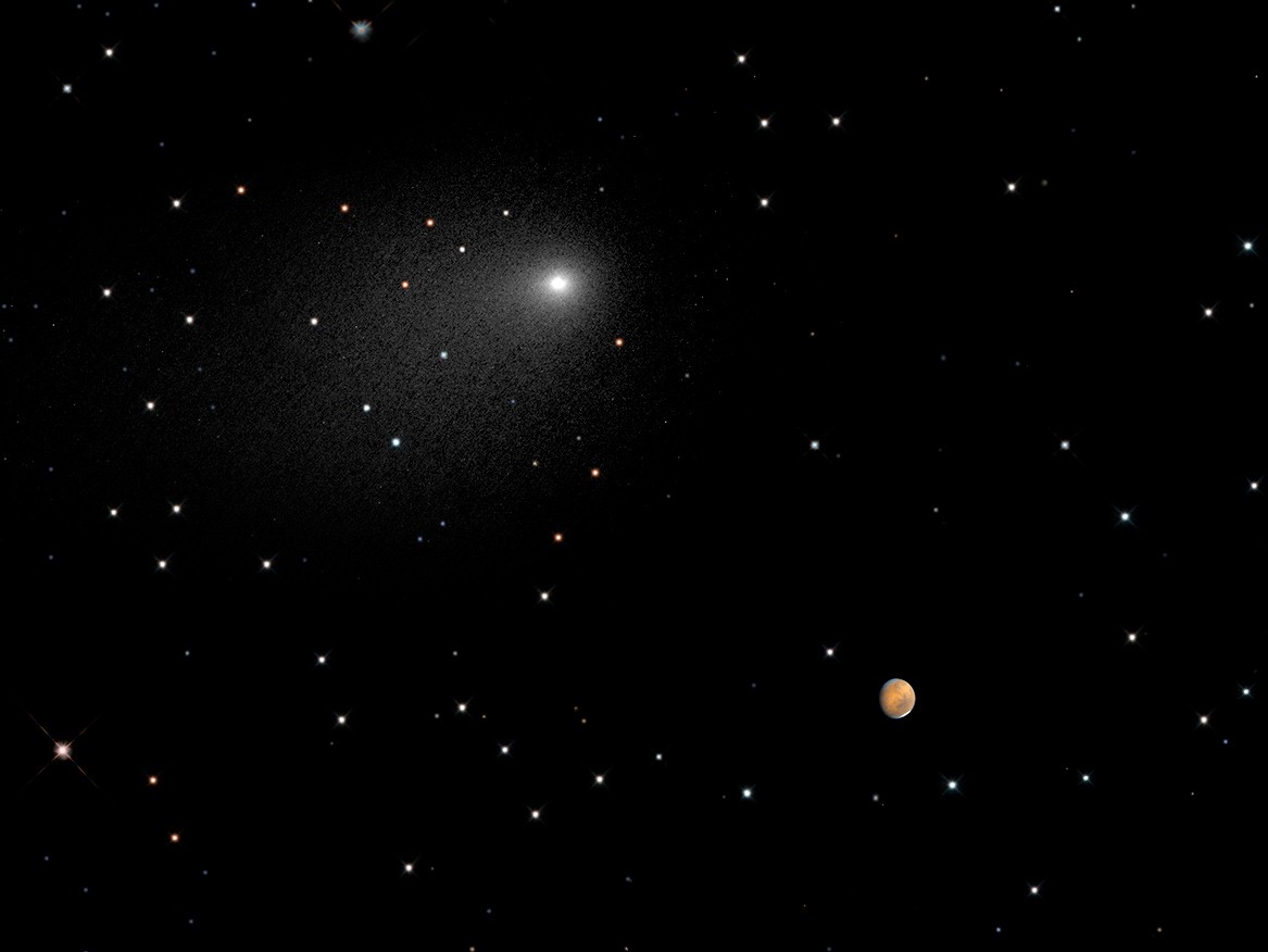 This composite image captures the positions of comet 'Siding Spring' and Mars in a never-before-seen close passage of a comet by the Red Planet, on Oct. 19, 2014. (PSI/JHU/APL/STScI/AU/ESA/NASA)