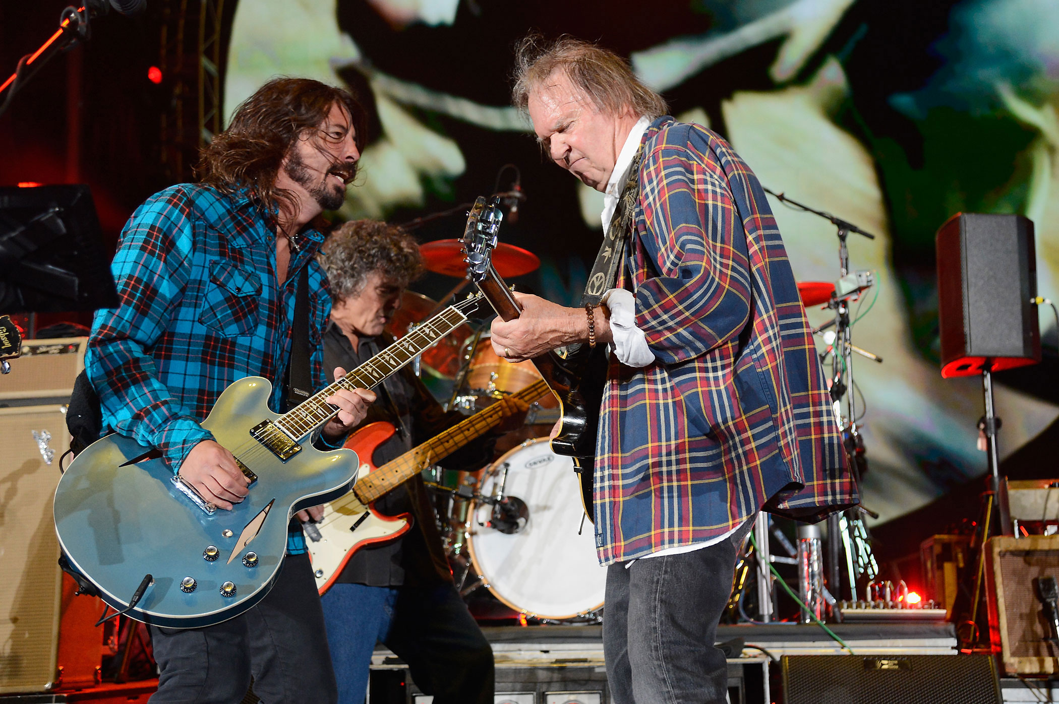 Dave Grohl and  Neil Young perform onstage at The Global Citizen Festival in Central Park to end extreme poverty on the Great Lawn on September 29, 2012 in New York City.