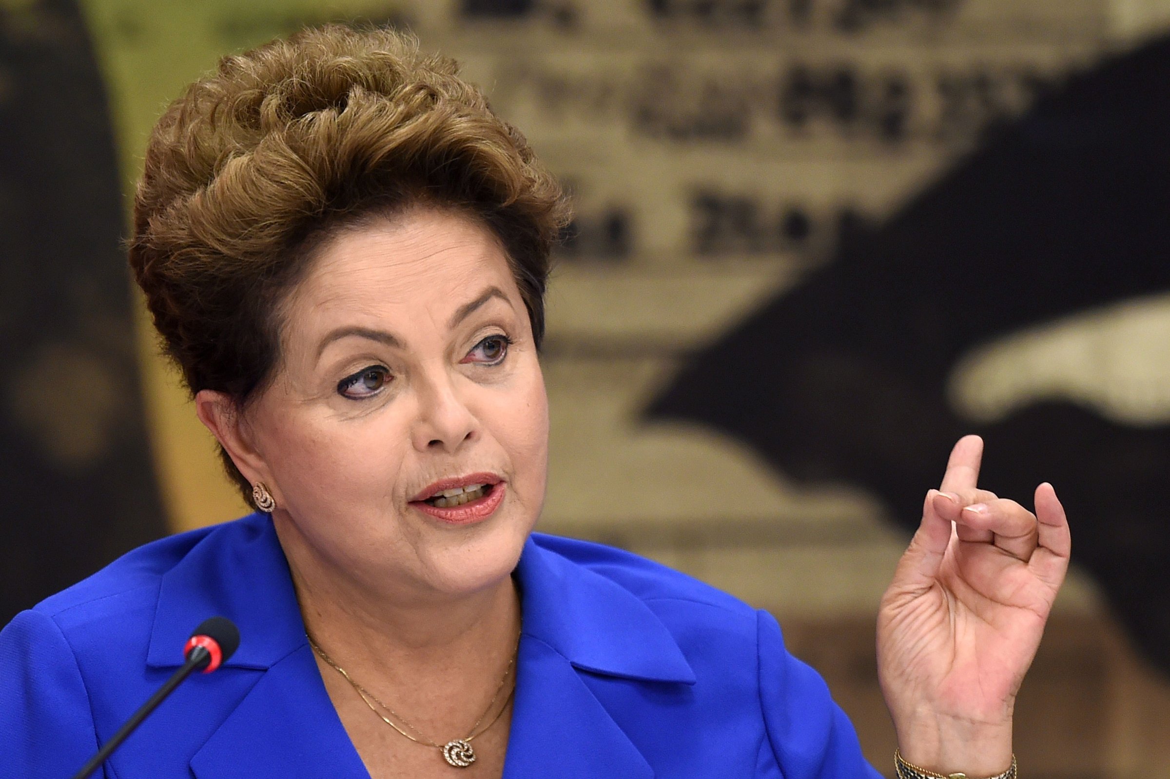 Brazil's President and presidential candidate for the Workers' Party Dilma Rousseff, speaks during a meeting with Governors and Senators elected in the first round of general elections, in Brasilia, Brazil on Oct. 7, 2014.