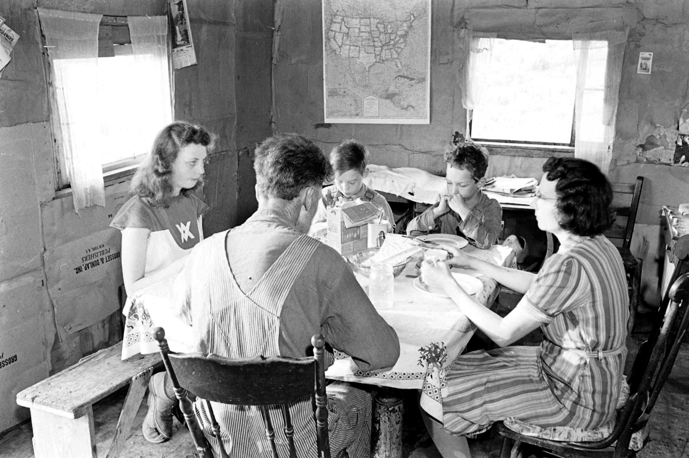 Oklahoma farming family at meal, 1942.