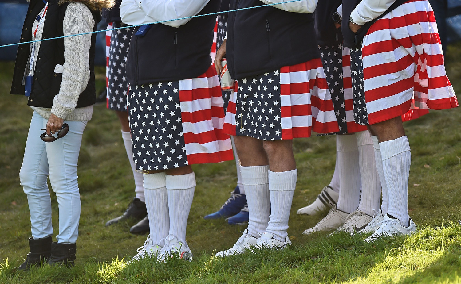 US fans wear patriotic clothing during the 2014 Ryder Cup competition between Europe and the USA, as they watch the foursomes golf matches at Gleneagles in Scotland, on Sept. 26, 2014.