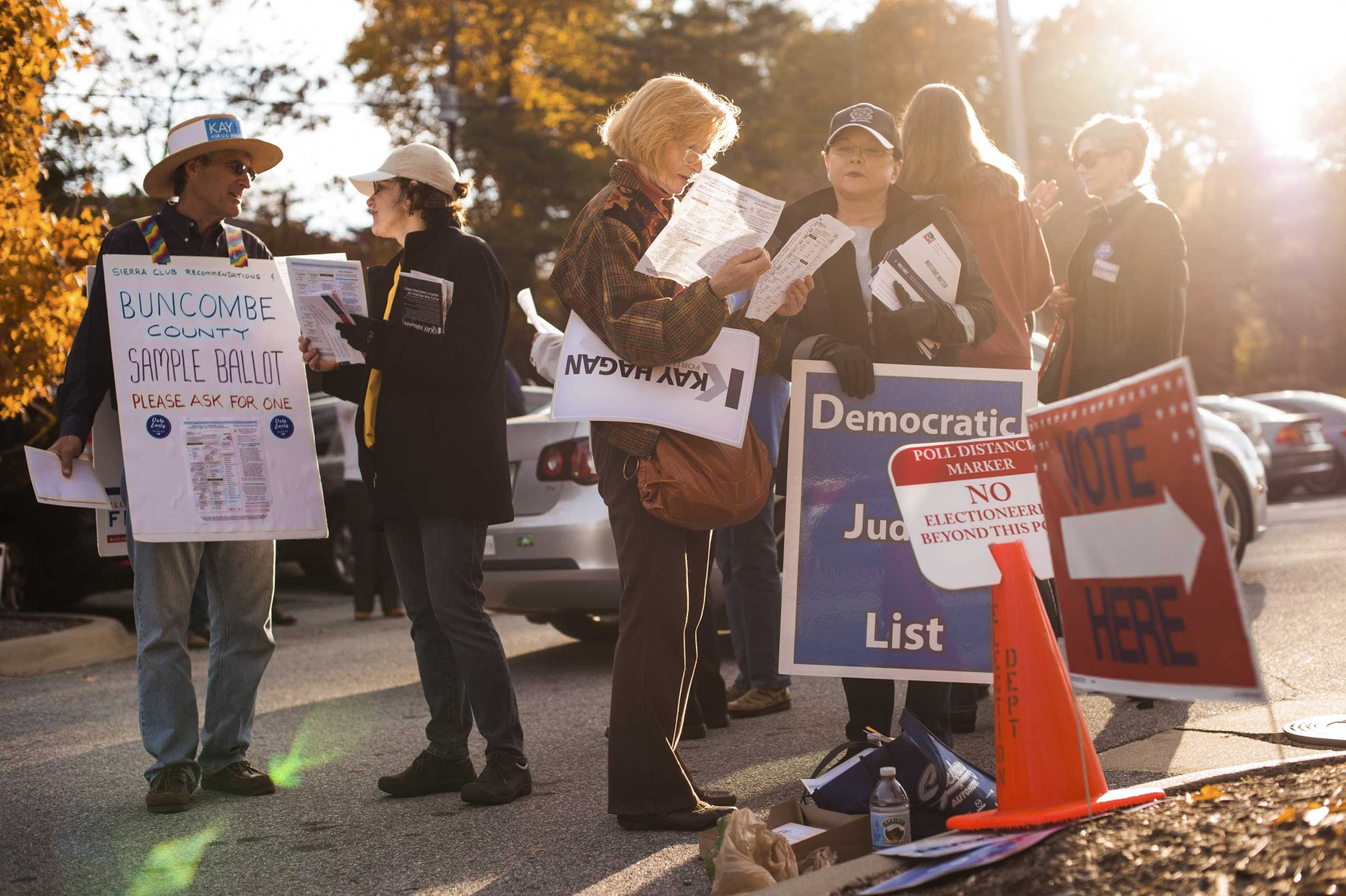 Supporters of Sen. Kay Hagan (D-N.C.) outside of a polling place in Asheville, N.C., Oct. 28, 2014. (Mike Belleme—The New York Times/Redux)