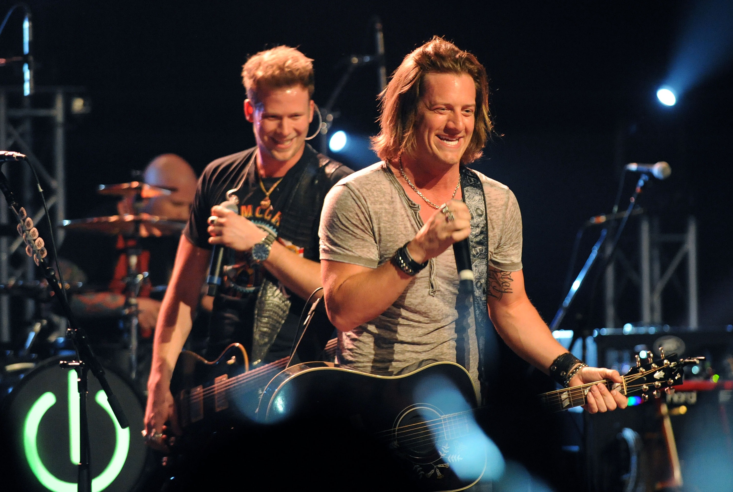 From left: Brian Kelley and Tyler Hubbard of Florida Georgia Line perform at the Georgia Theatre on March 20, 2013 in Athens, Ga.