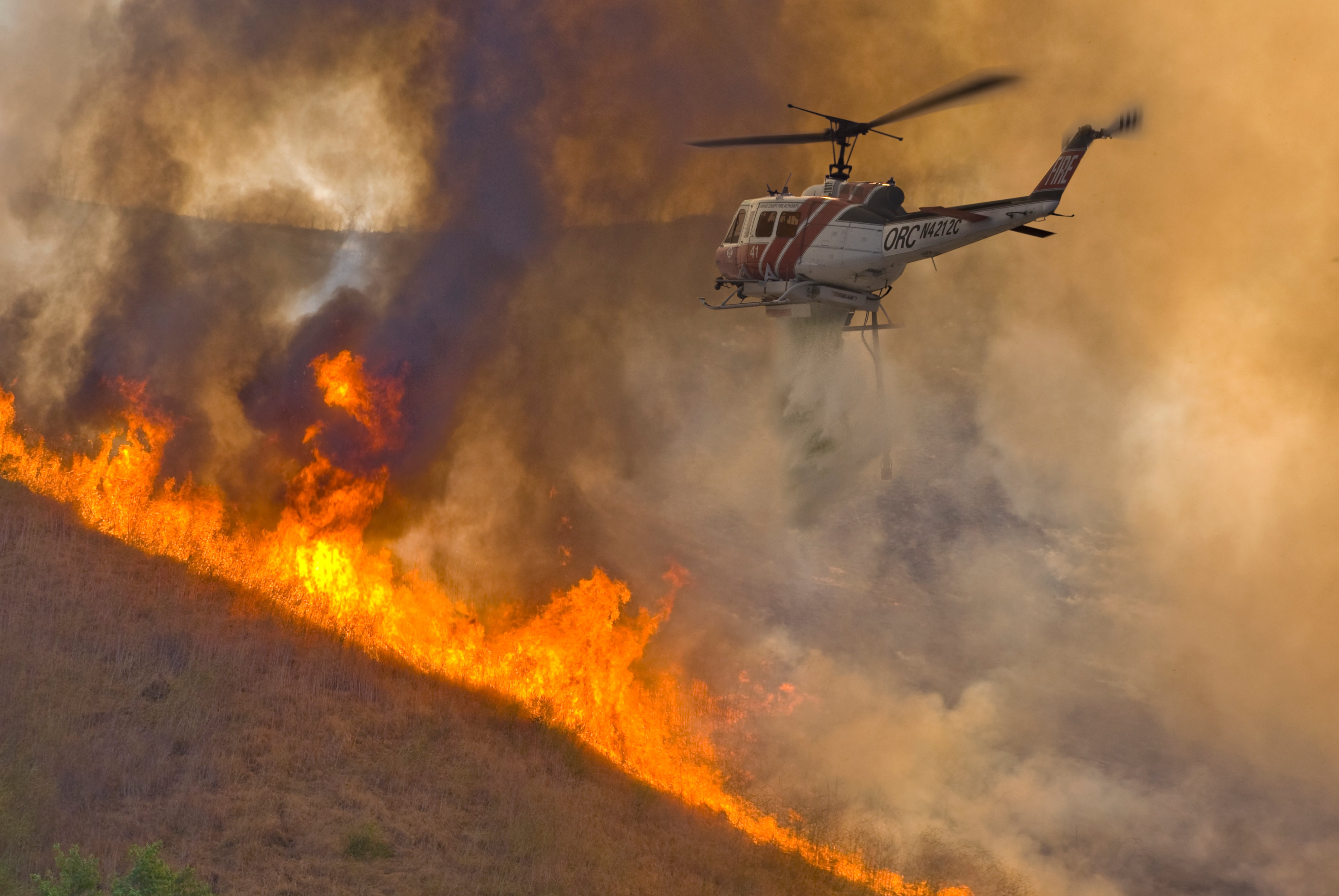 Forest fire and helicopter