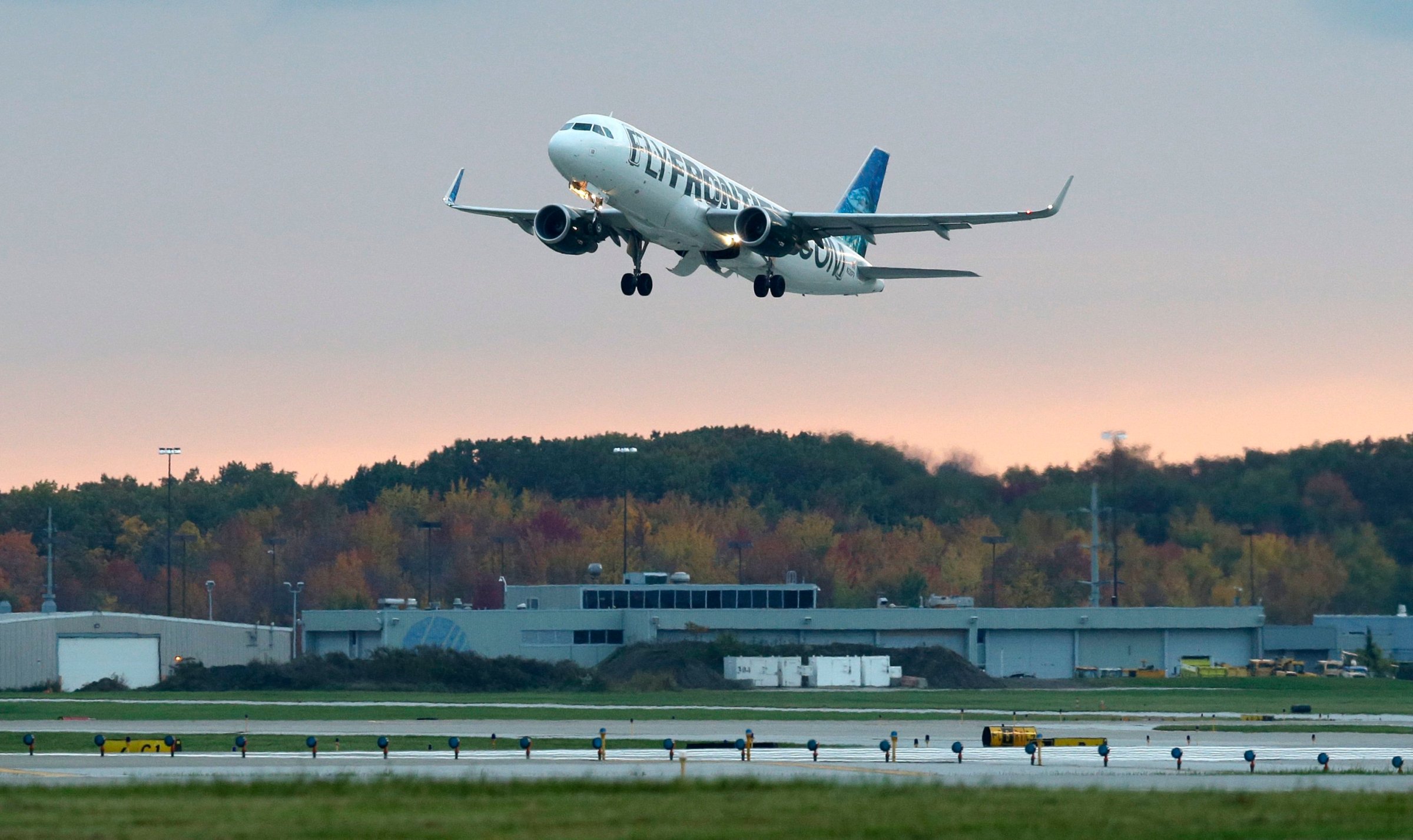 The Frontier Airlines plane that Amber Vinson flew from Cleveland to Dallas on Monday, flies out of Cleveland Hopkins International Airport Wednesday, Oct. 15, 2014, in Cleveland.