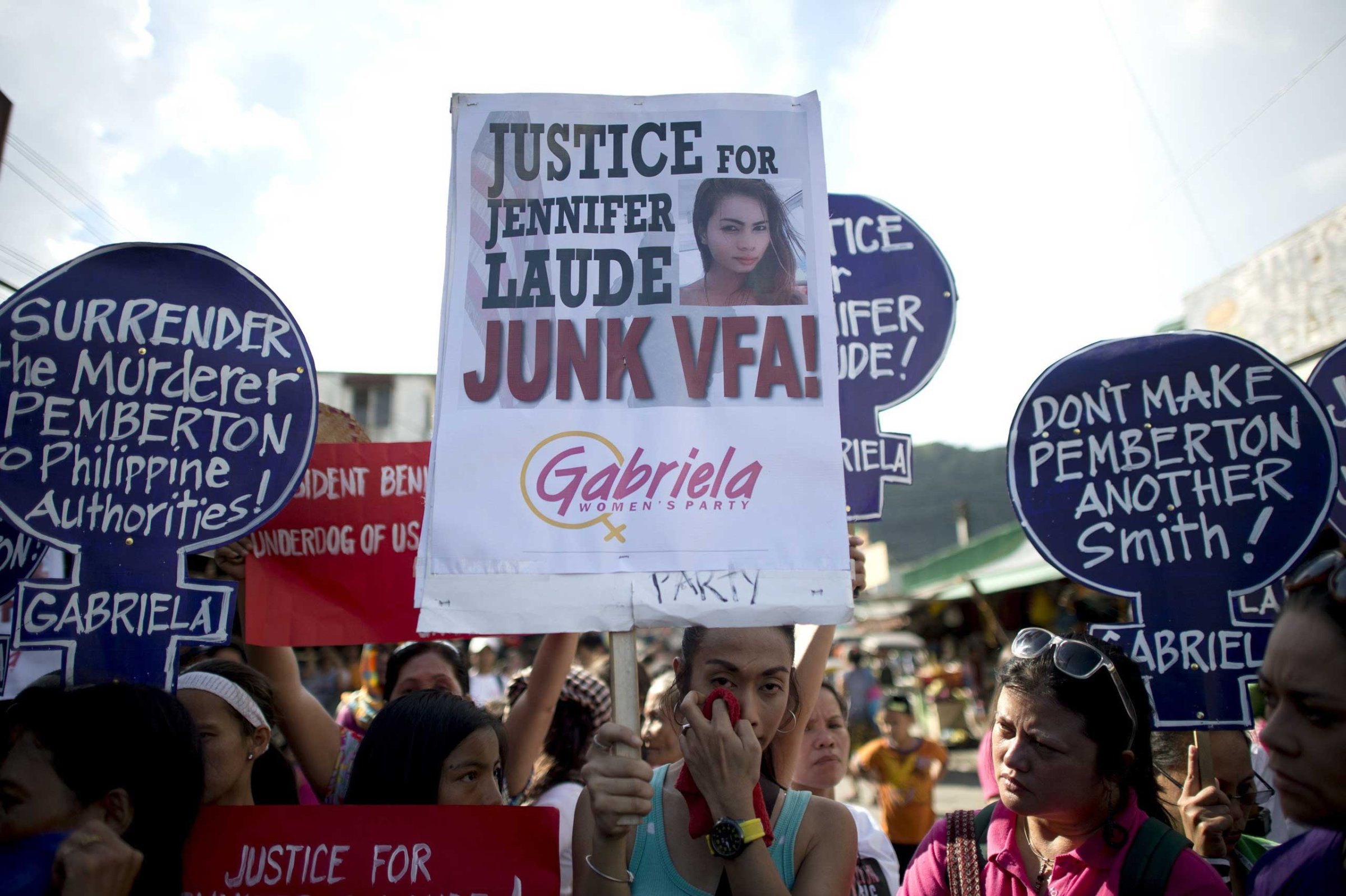 Supporters of murdered Filipino transgender Jeffrey Laude, also known as "Jennifer", hold a protest near the Hall of Justice where the preliminary hearing for the murder case is being held at the northern Philippine city of Olongapo on Oct. 10, 2014.