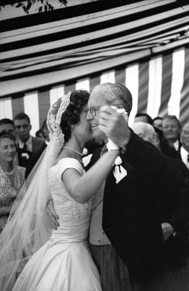 Jacqueline Kennedy dances with her new father-in-law, Joseph P. Kennedy, at wedding reception, Newport, R.I., Sept. 12, 1953.