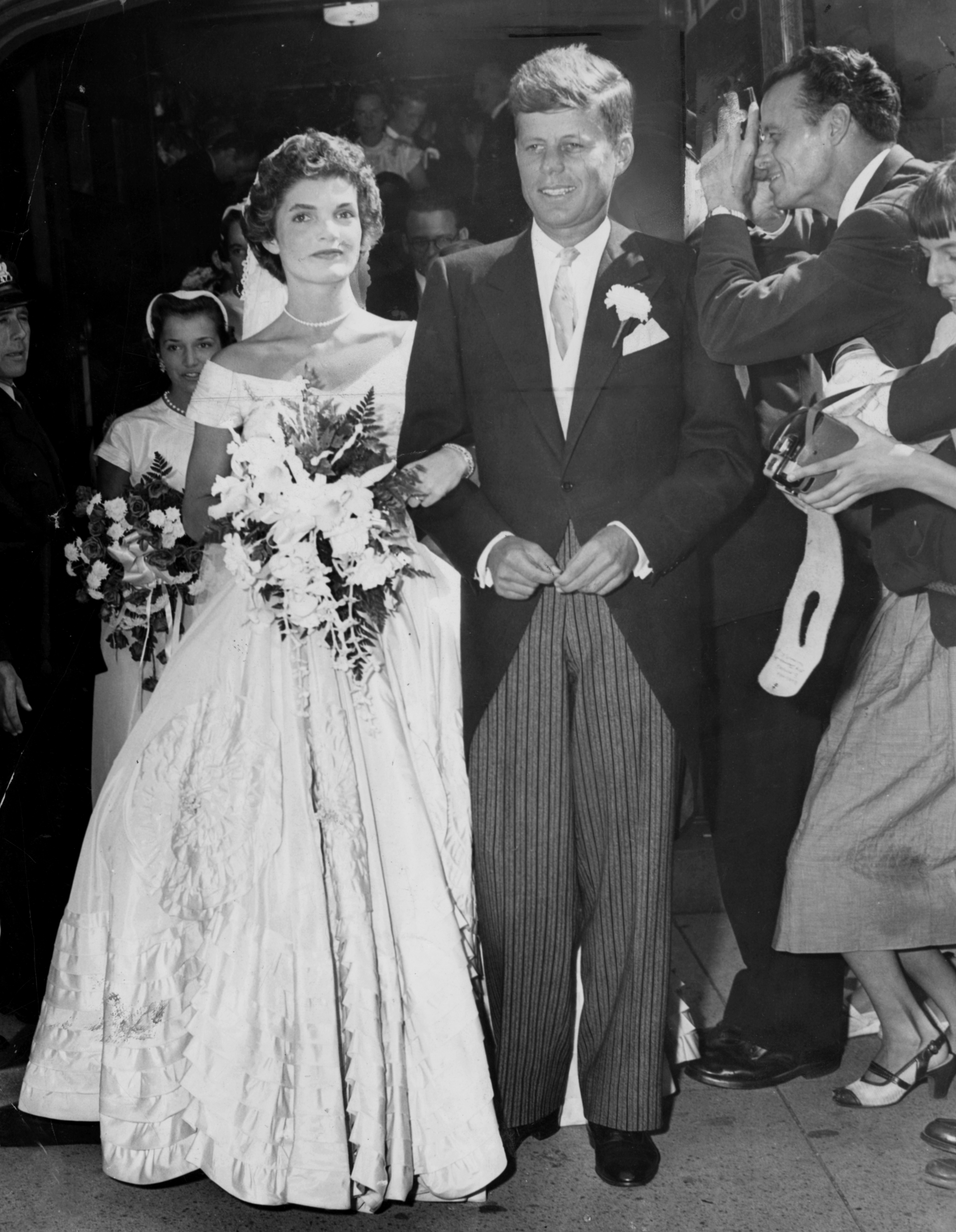 John F. Kennedy and Jacqueline Kennedy outside St. Mary's Church in Newport, R.I., after their wedding on Sept. 12, 1953 (Charles F. McCormick—Boston Globe/Getty Images)